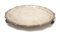 An English Silver Salver, London, Diameter 14 1/4 inches.