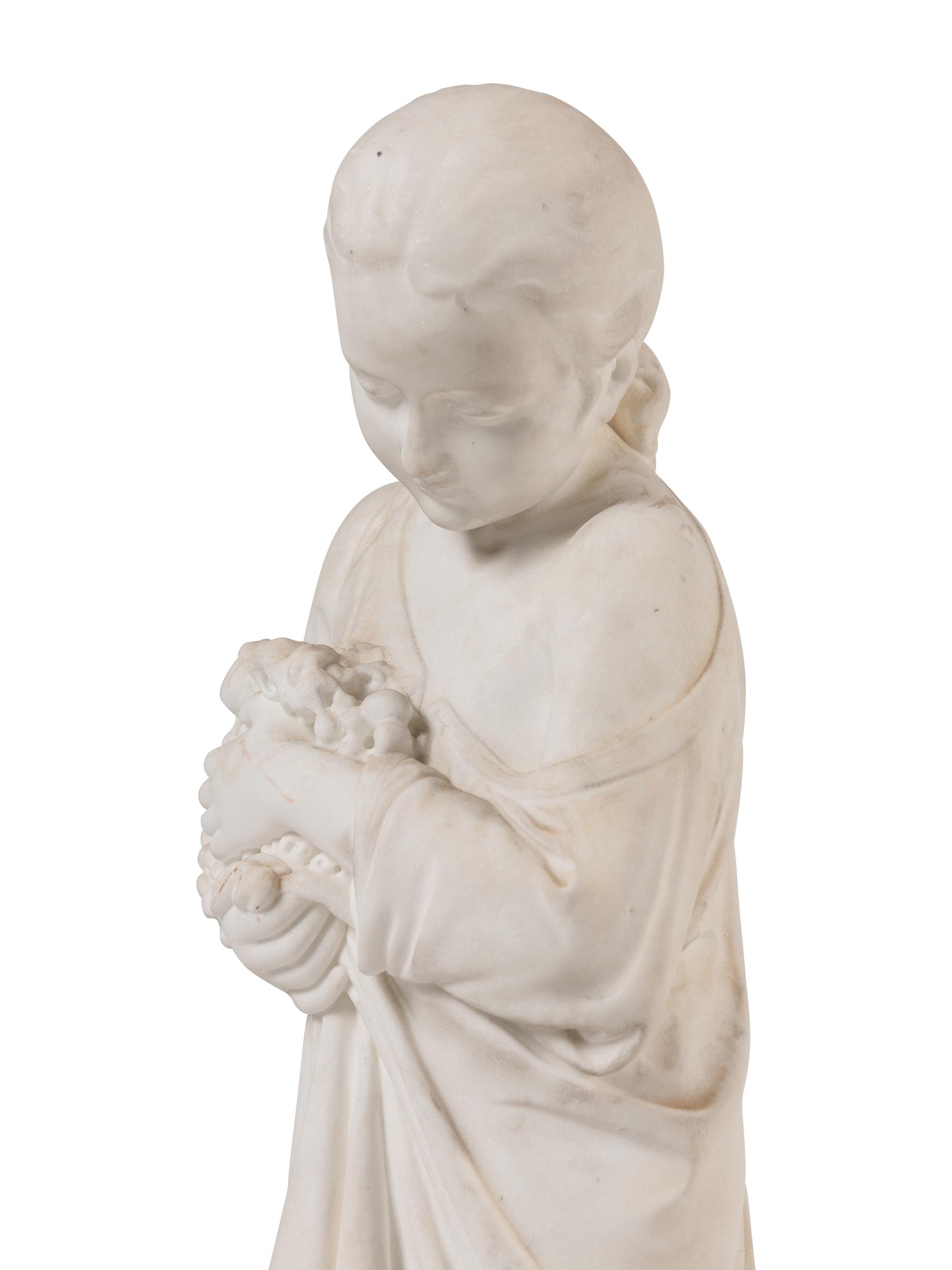 A Pair of Italian Carved Marble Figures of a Boy and Girl
