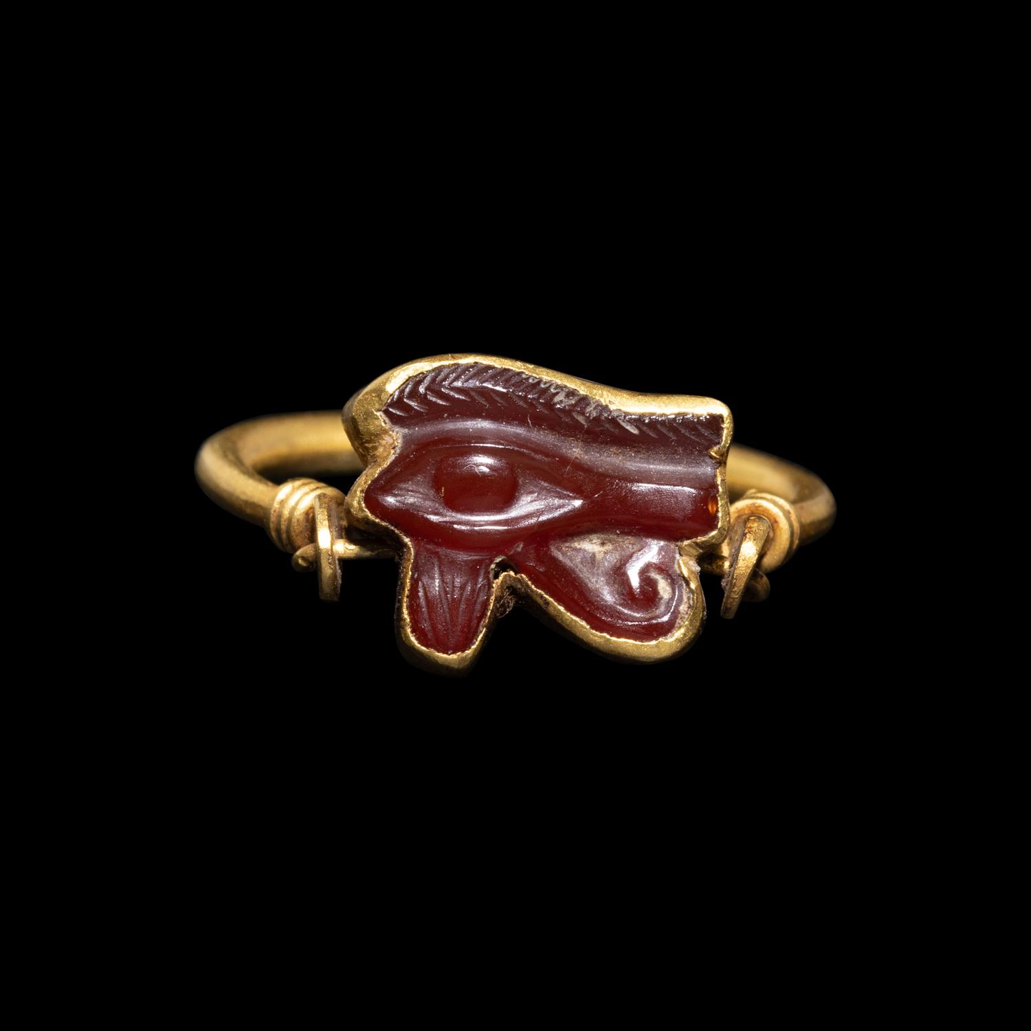 An Egyptian Carnelian Wadjet — Set in a gold swivel ring