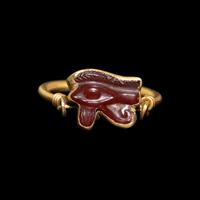 An Egyptian Carnelian Wadjet — Set in a gold swivel ring