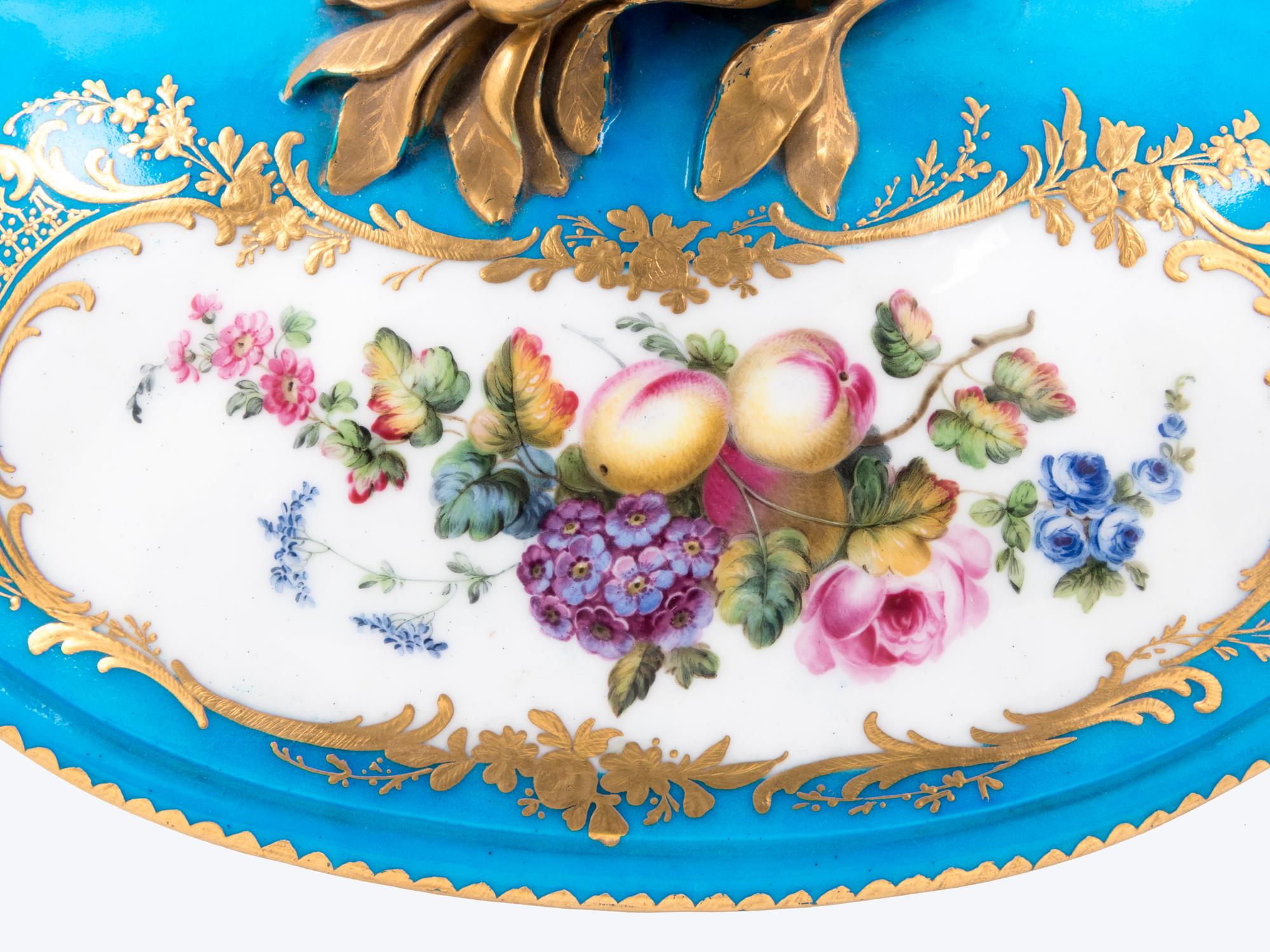 A Sèvres Painted and Parcel Gilt Turquoise-Ground Porcelain Covered Tureen
