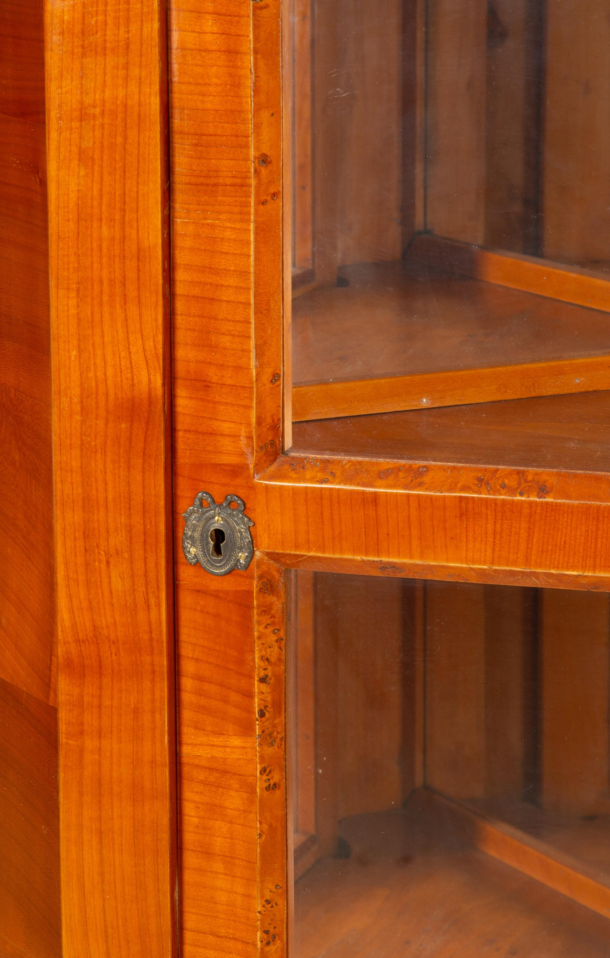 A Pair of Biedermeier Bird's Eye Maple and Walnut Corner Cabinets — Mid-19th Century