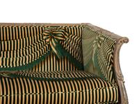 A Louis XV Style Carved and Stained Mahogany Sofa