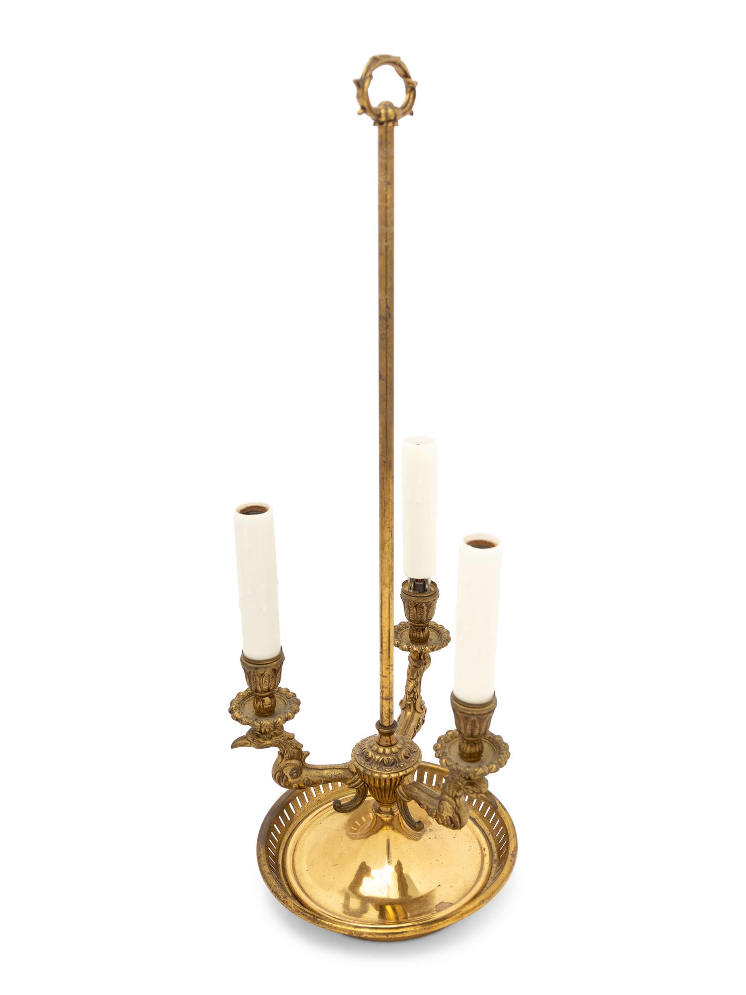 An Empire Style Brass Bouillotte Lamp with a Tole Shade