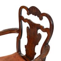 A George II/III Shell-Carved Oak and Walnut Armchair