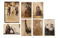 [NATIVE AMERICANS]. A group of 14 photographs highlighted by real photo postcards of Geronimo and Red Cloud.