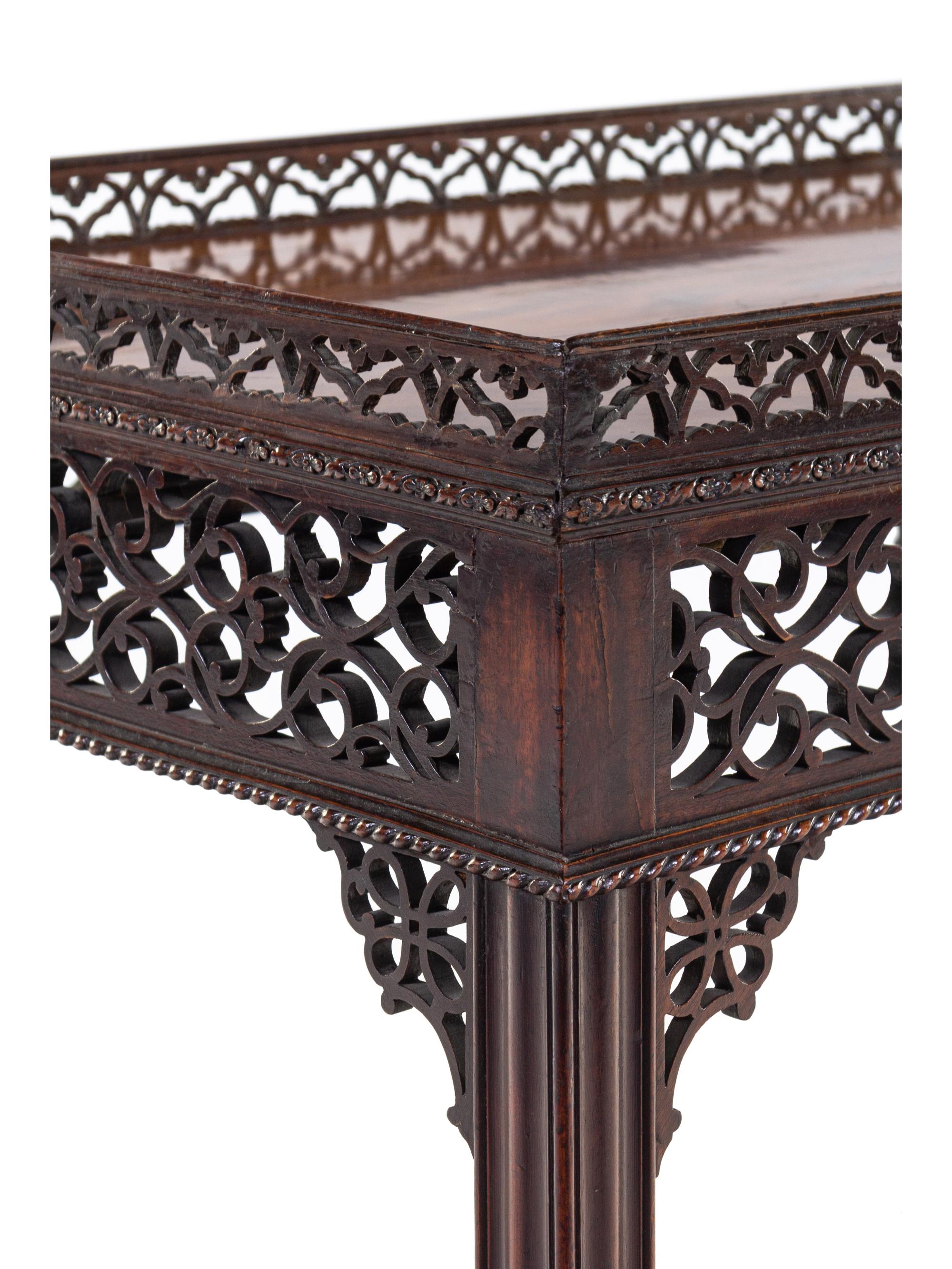 A George III Chinese Chippendale Style Carved and Figured Mahogany Silver Table