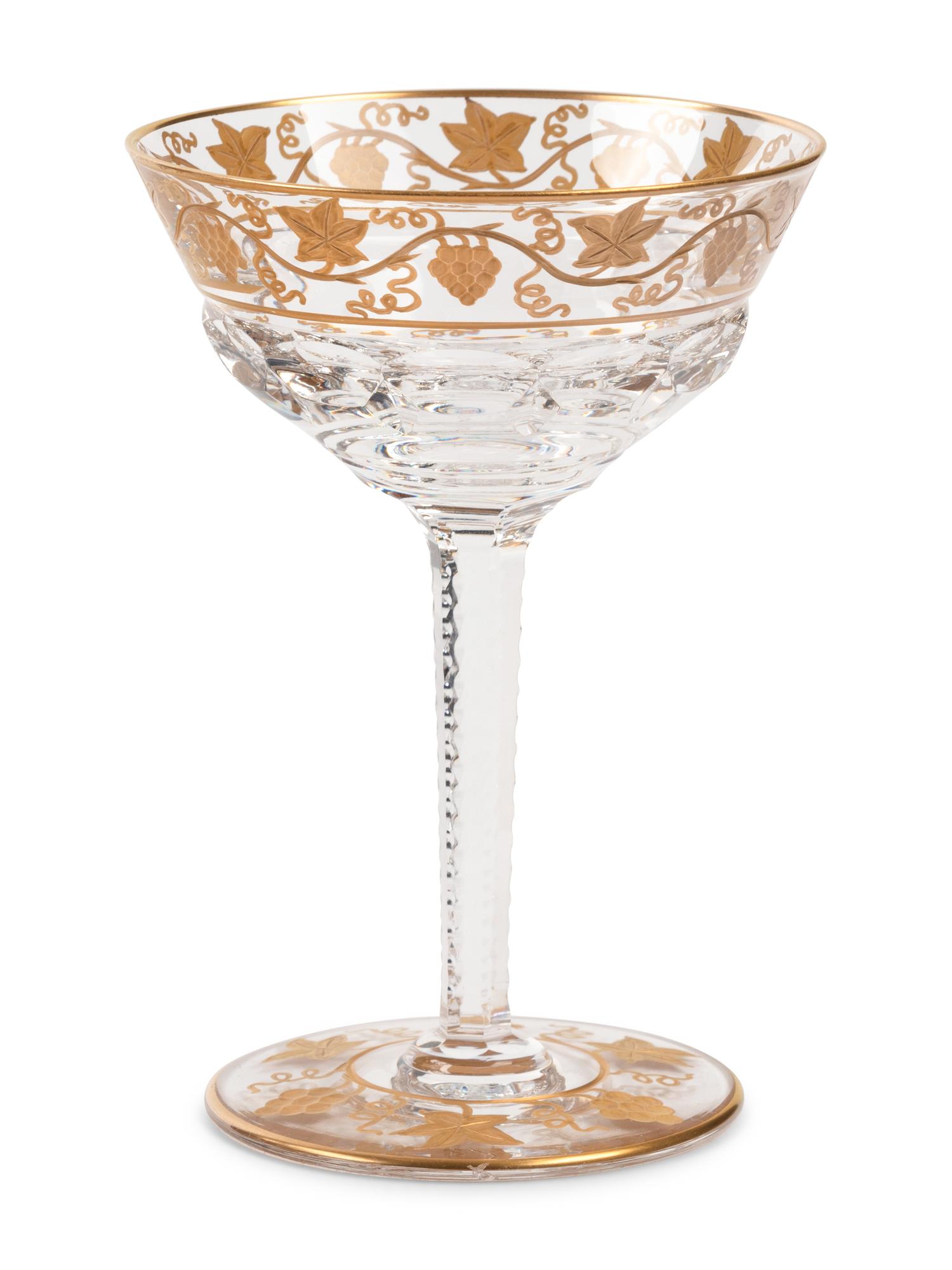 A Val Saint Lambert Gilt Decorated Cut Glass Table Service