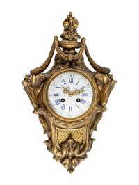 A Louis XVI Style Gilt Bronze Cartel Clock