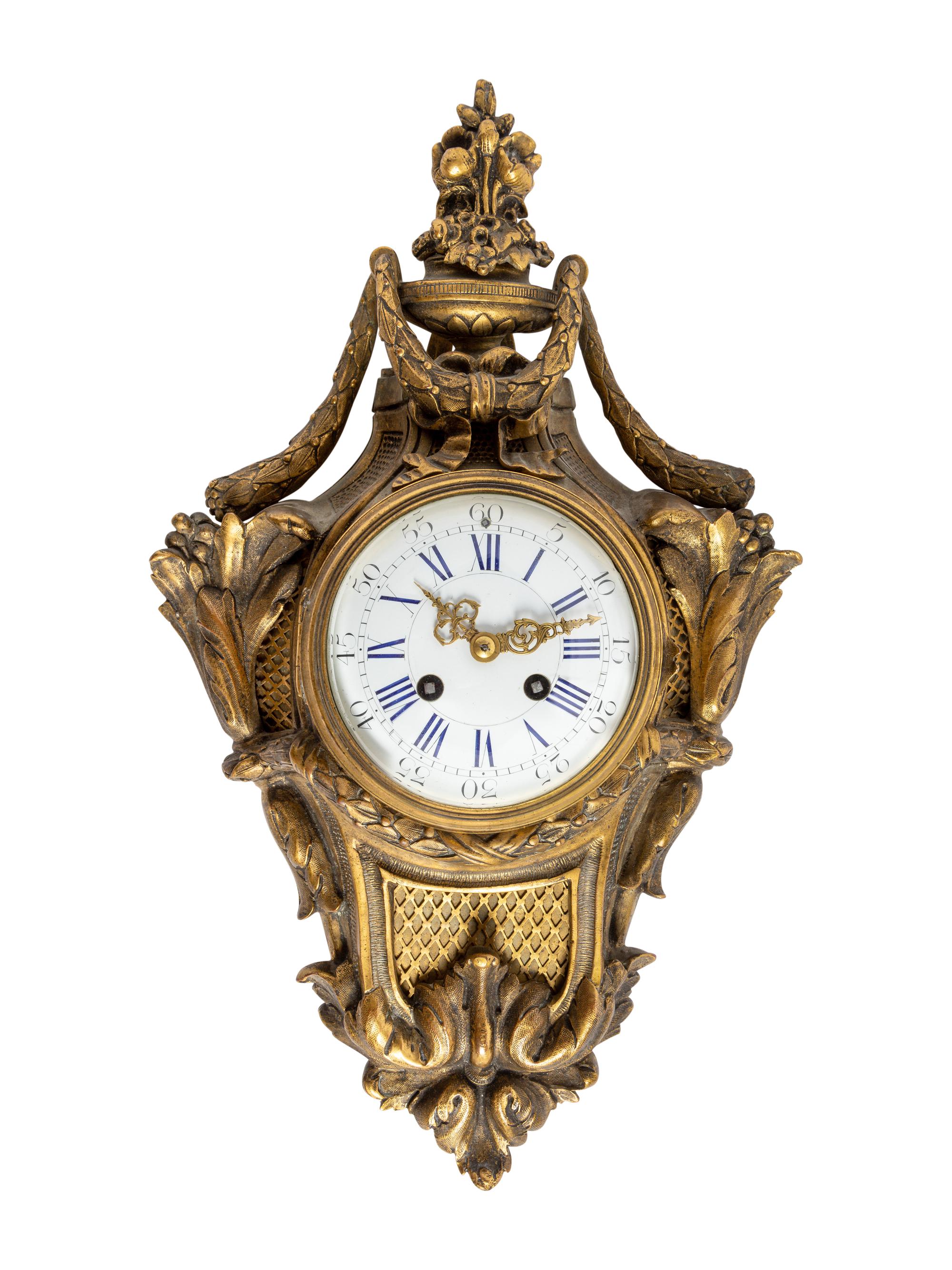A Louis XVI Style Gilt Bronze Cartel Clock