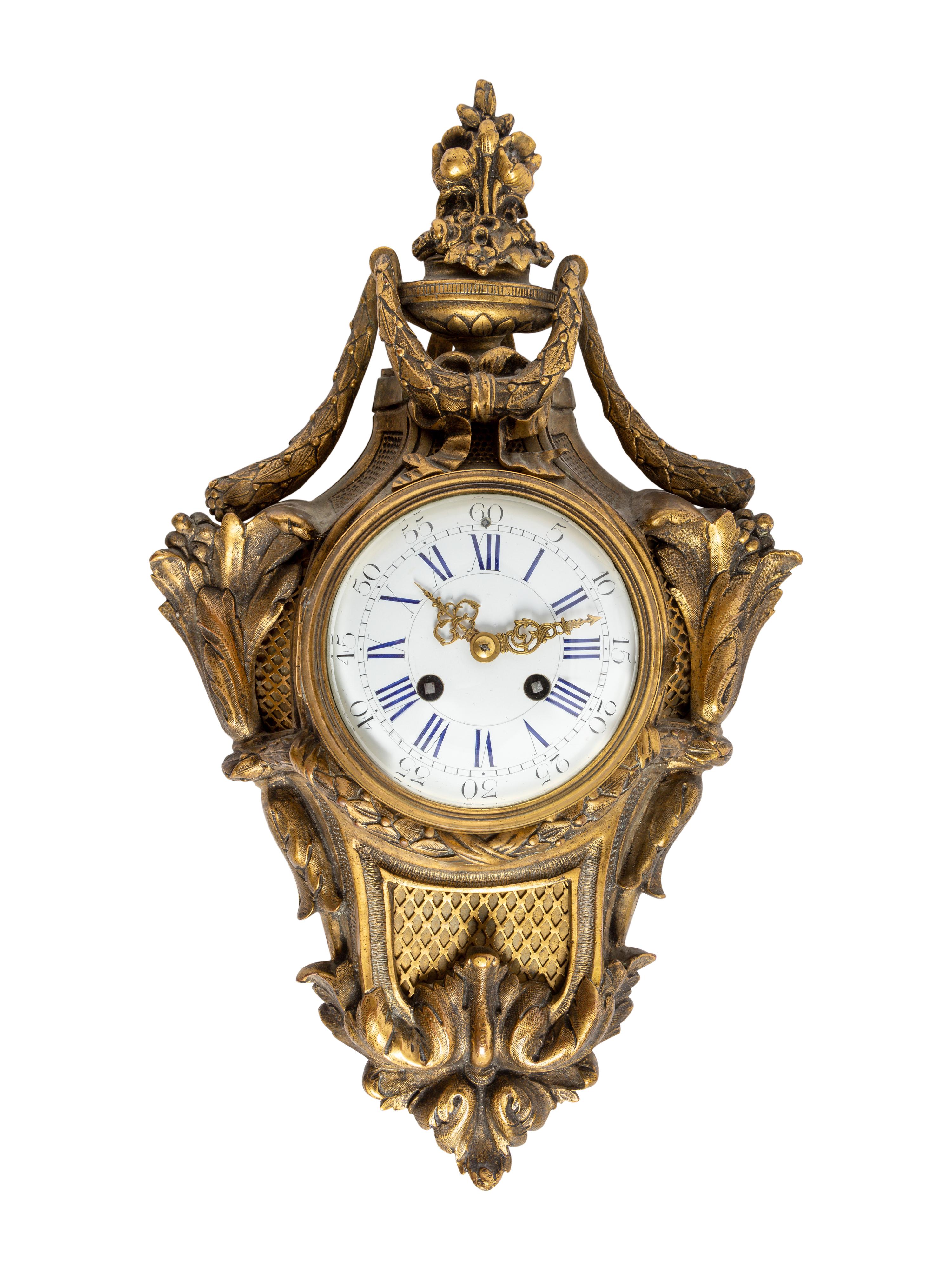 A Louis XVI Style Gilt Bronze Cartel Clock