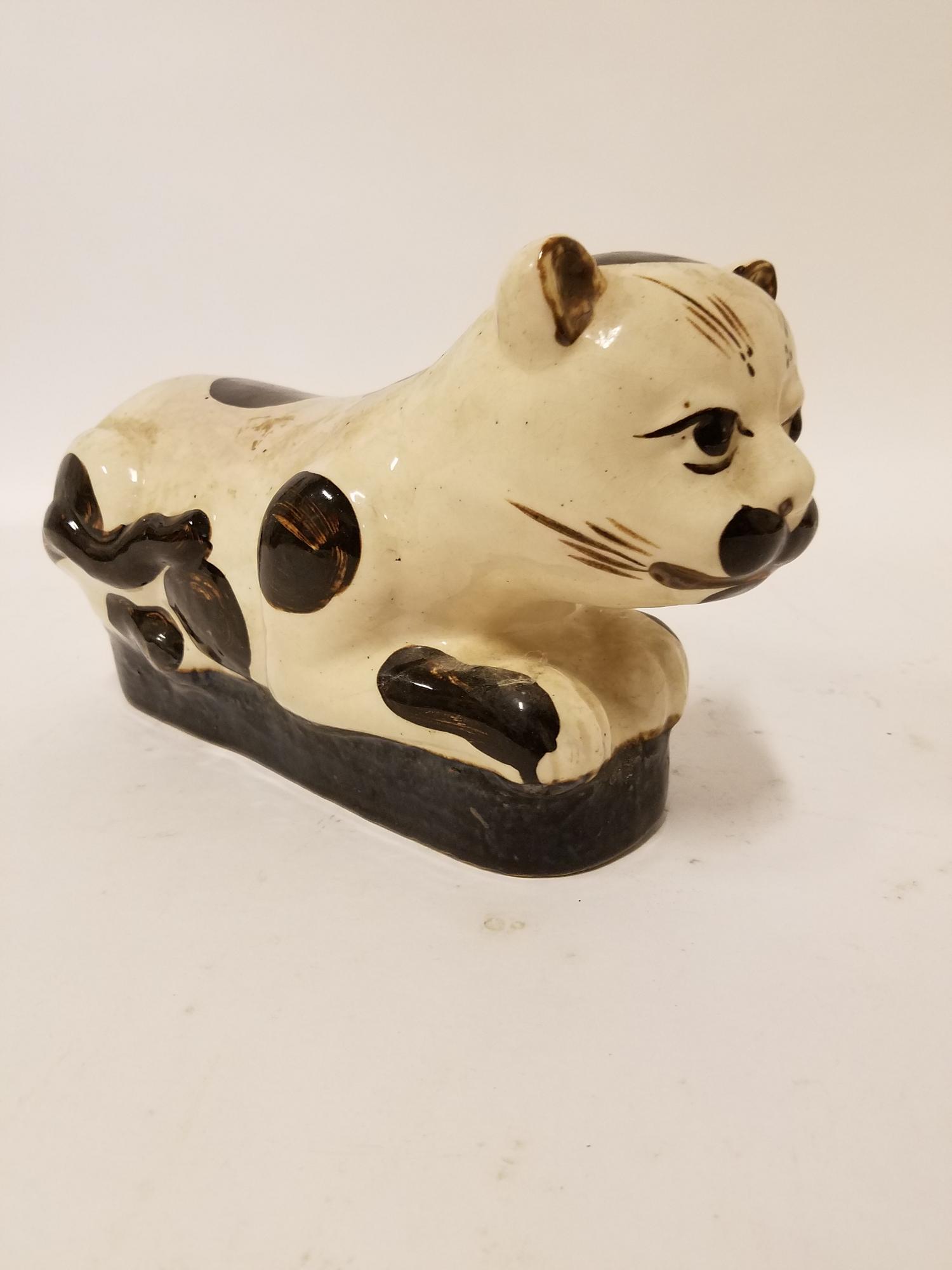 A Cizhou Type Porcelain Pillow. Length 14 inches.