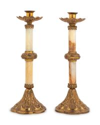 A Pair of Gilt Bronze Mounted Onyx Candlesticks