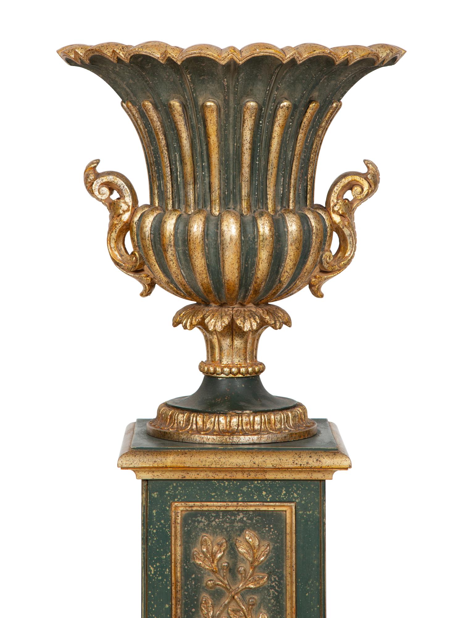 A Painted and Parcel Gilt Campagna-Form Urn on Pedestal