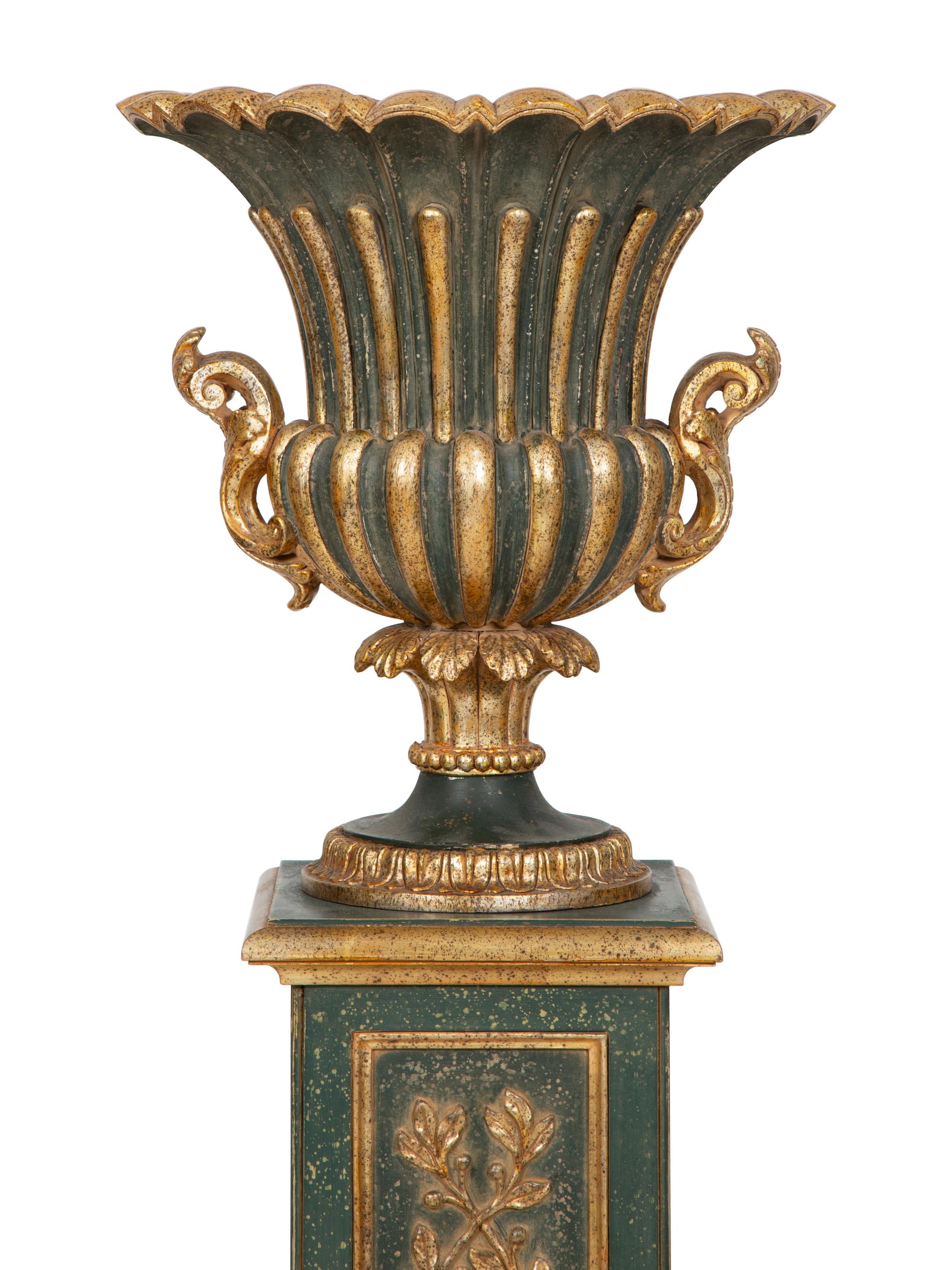 A Painted and Parcel Gilt Campagna-Form Urn on Pedestal