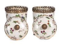 A Pair of United Wilson Gilt Metal Mounted Porcelain Urns