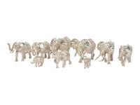 A Group of Nine Patrick Mavros Silver Elephants