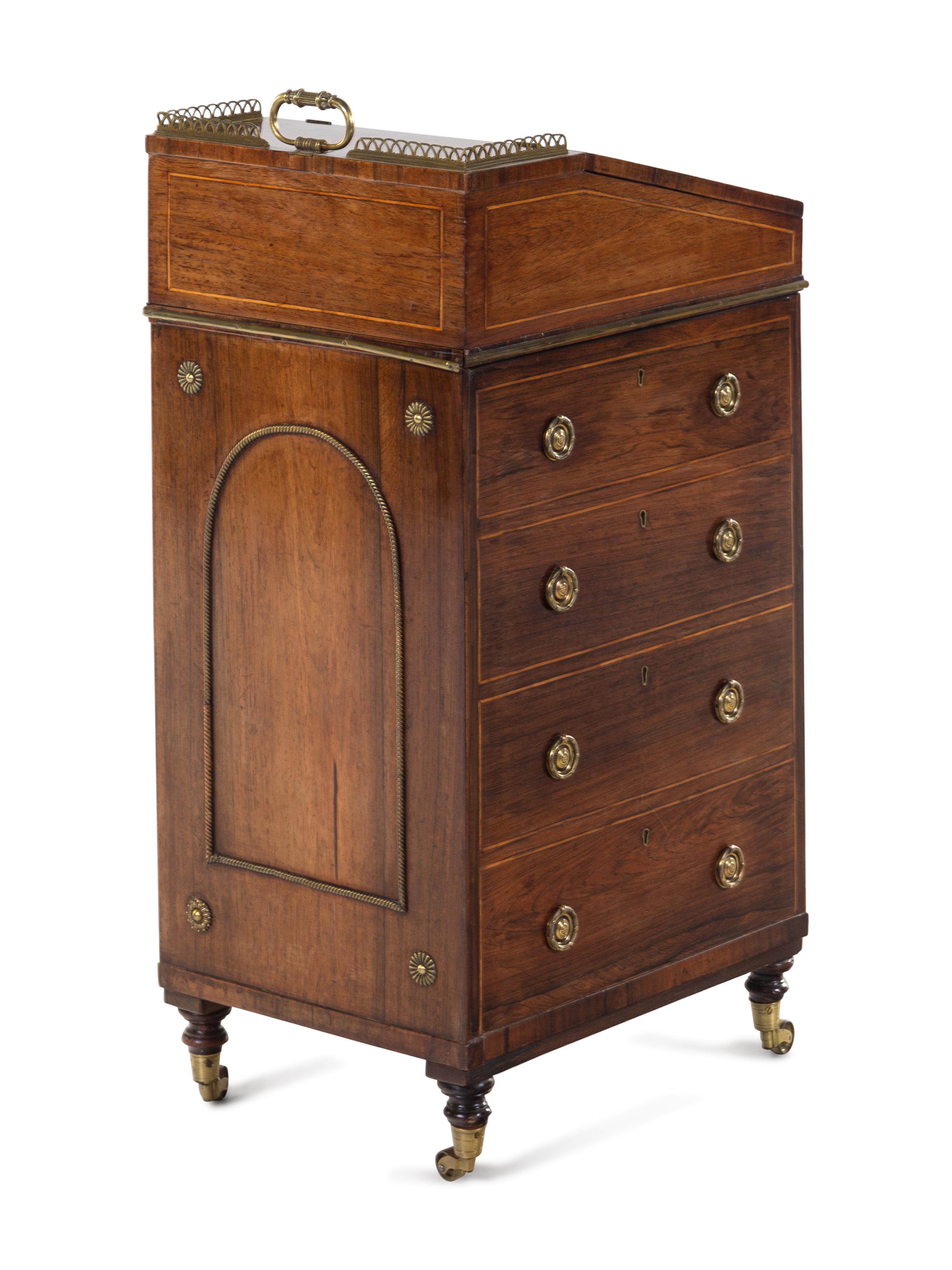 A Regency Brass Mounted and Leather-Inset Mahogany Davenport Desk