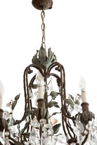 A Continental Patinated Bronze, Tole and Cut Glass Twelve-Light Chandelier