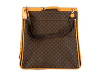 A Louis Vuitton Leather Garment Bag — 20TH CENTURY