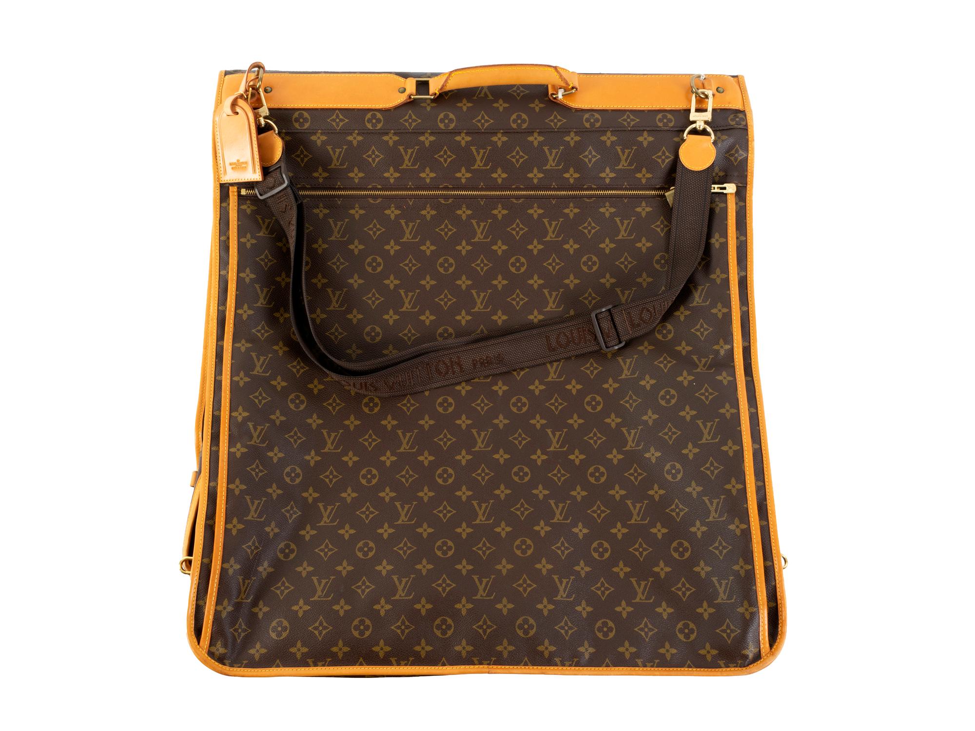 A Louis Vuitton Leather Garment Bag — 20TH CENTURY