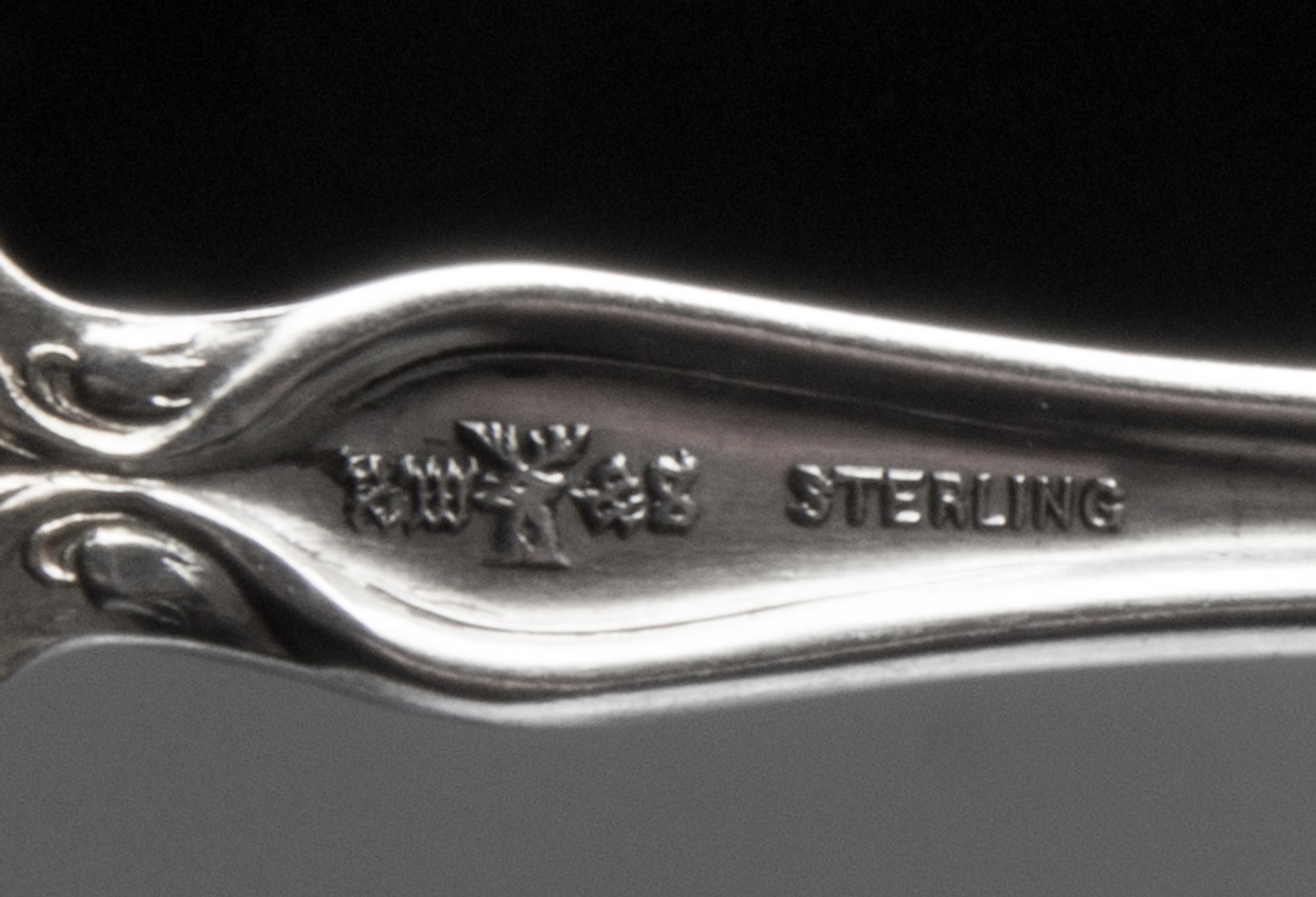 Two American Art Nouveau Silver Servers, , comprising a sauce ladle, R. Wallace & Sons Mfg. Co., Wallingford, CT and a sugar server.