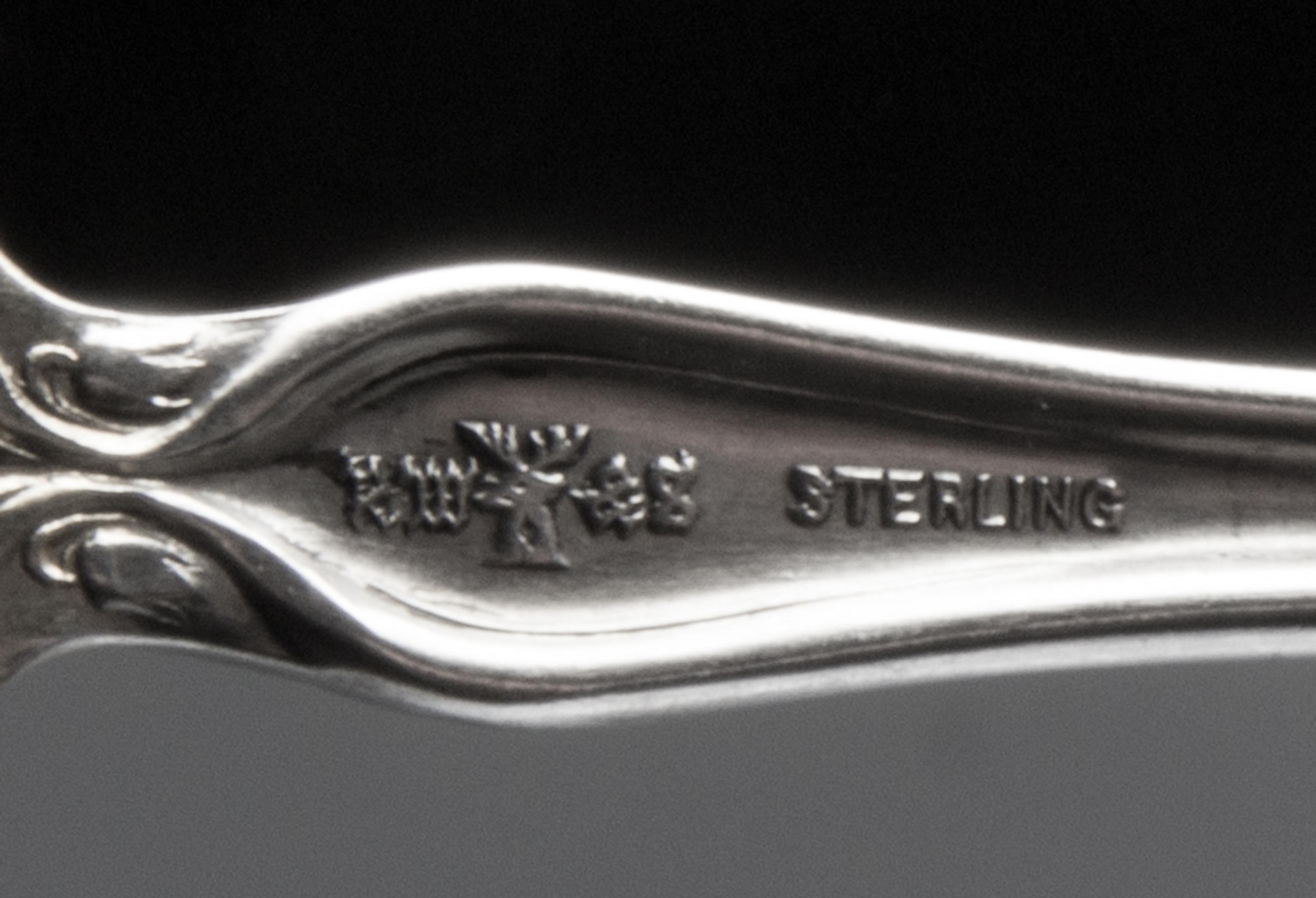 Two American Art Nouveau Silver Servers, , comprising a sauce ladle, R. Wallace & Sons Mfg. Co., Wallingford, CT and a sugar server.