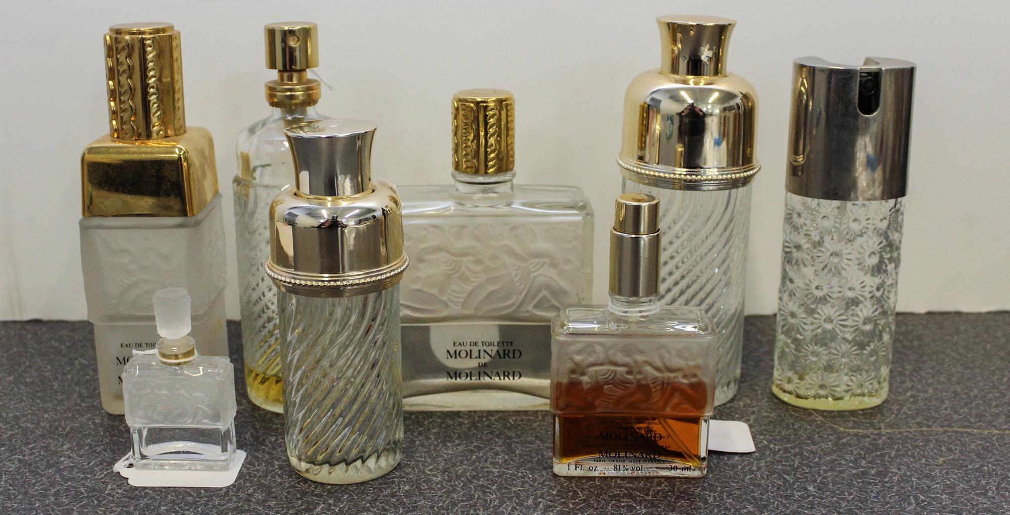 Eight Lalique and Other Perfume Bottles. Height of tallest 6 inches.