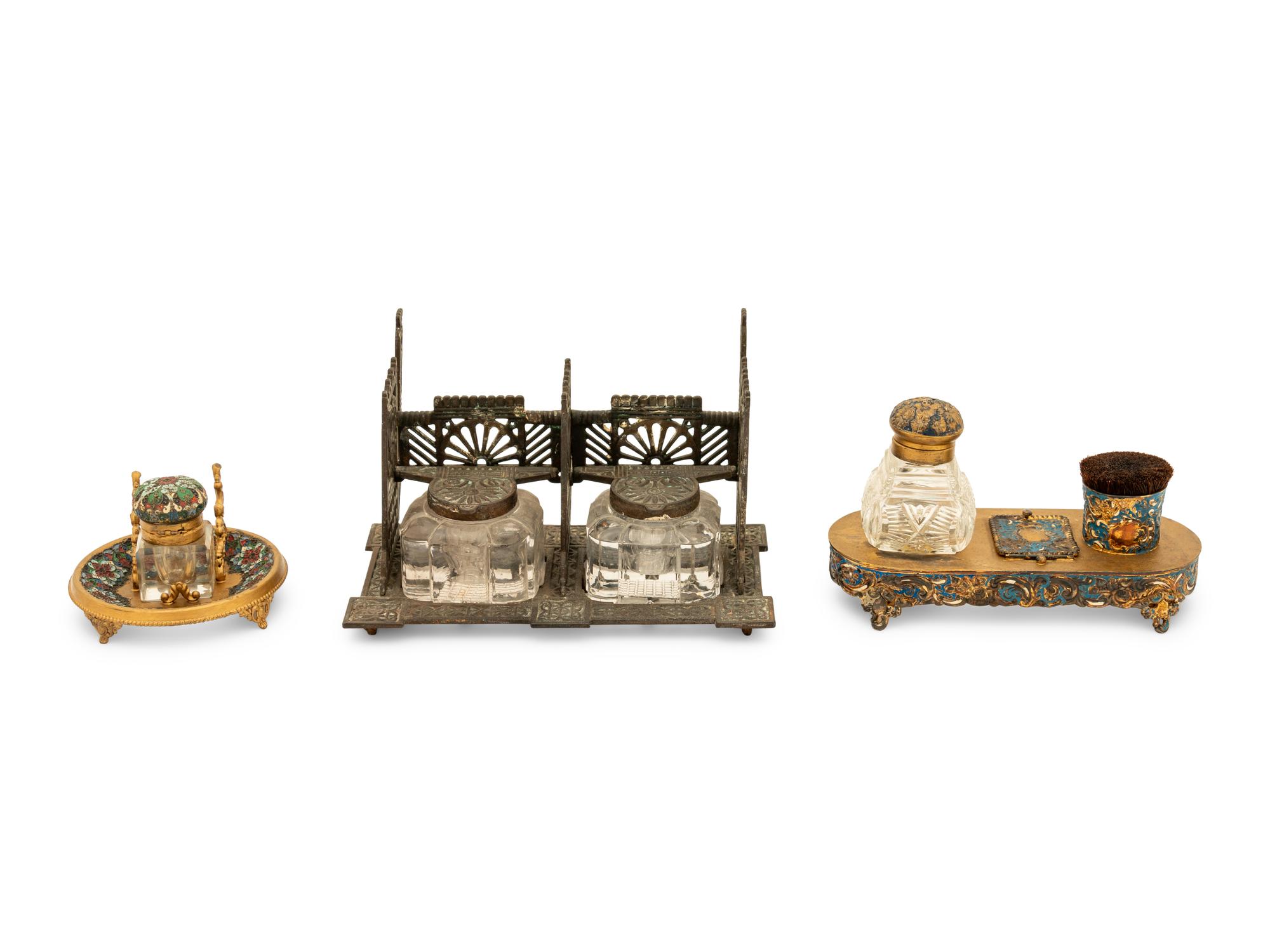A Group of Enamel and Cast Iron Inkwells