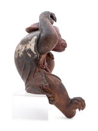A Carved Wood Figure of a Monkey