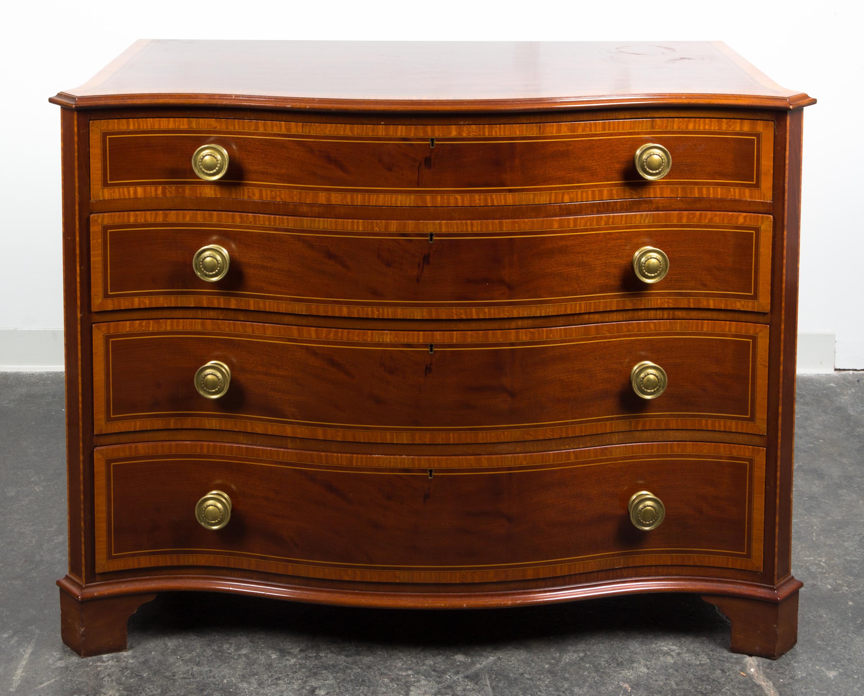 A Regency Style Inlaid Chest of Drawers Height 36 x width 46 x depth 22 1/2 inches.