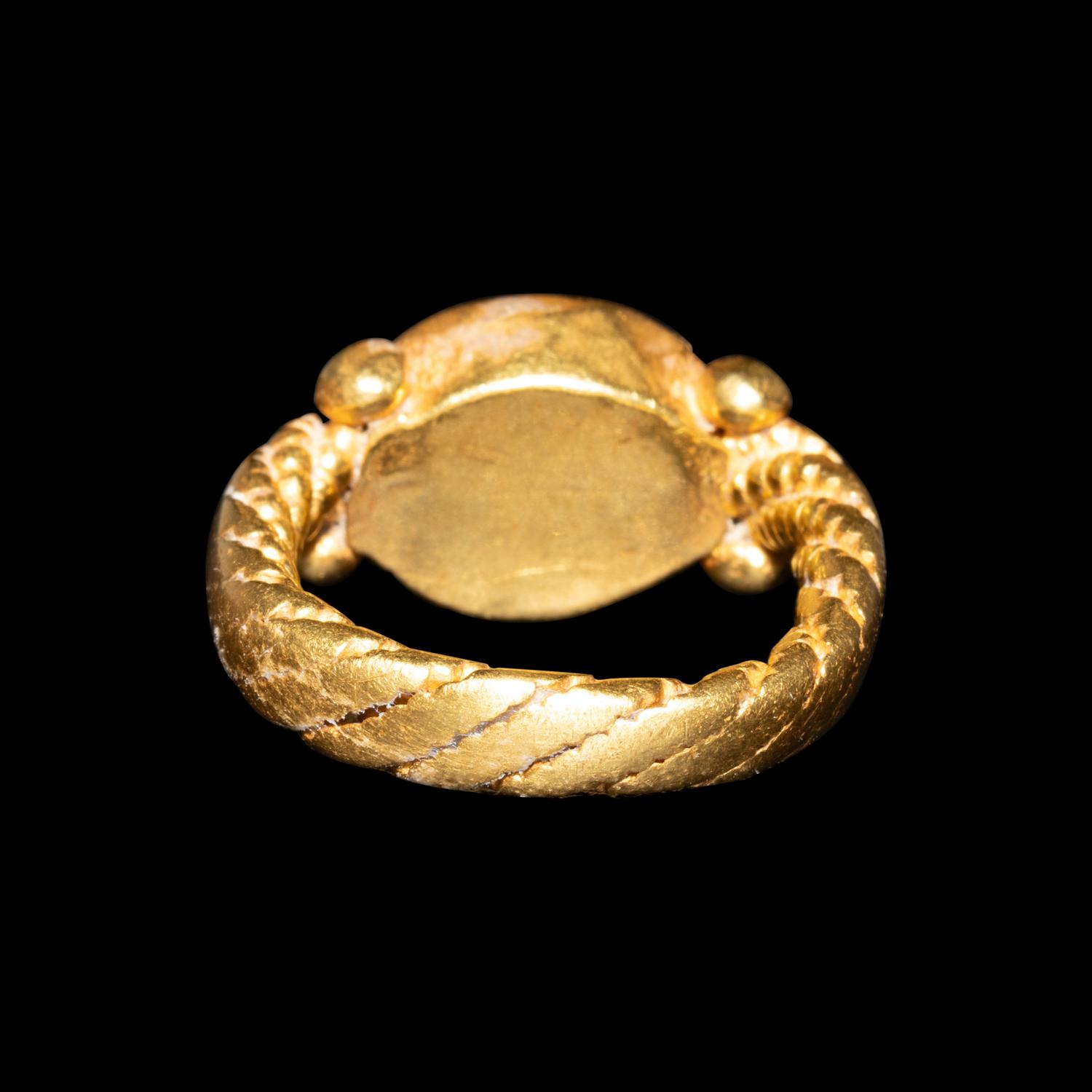 An Italic Carnelian Intaglio with Perseus — Set in a Late Roman gold ring
