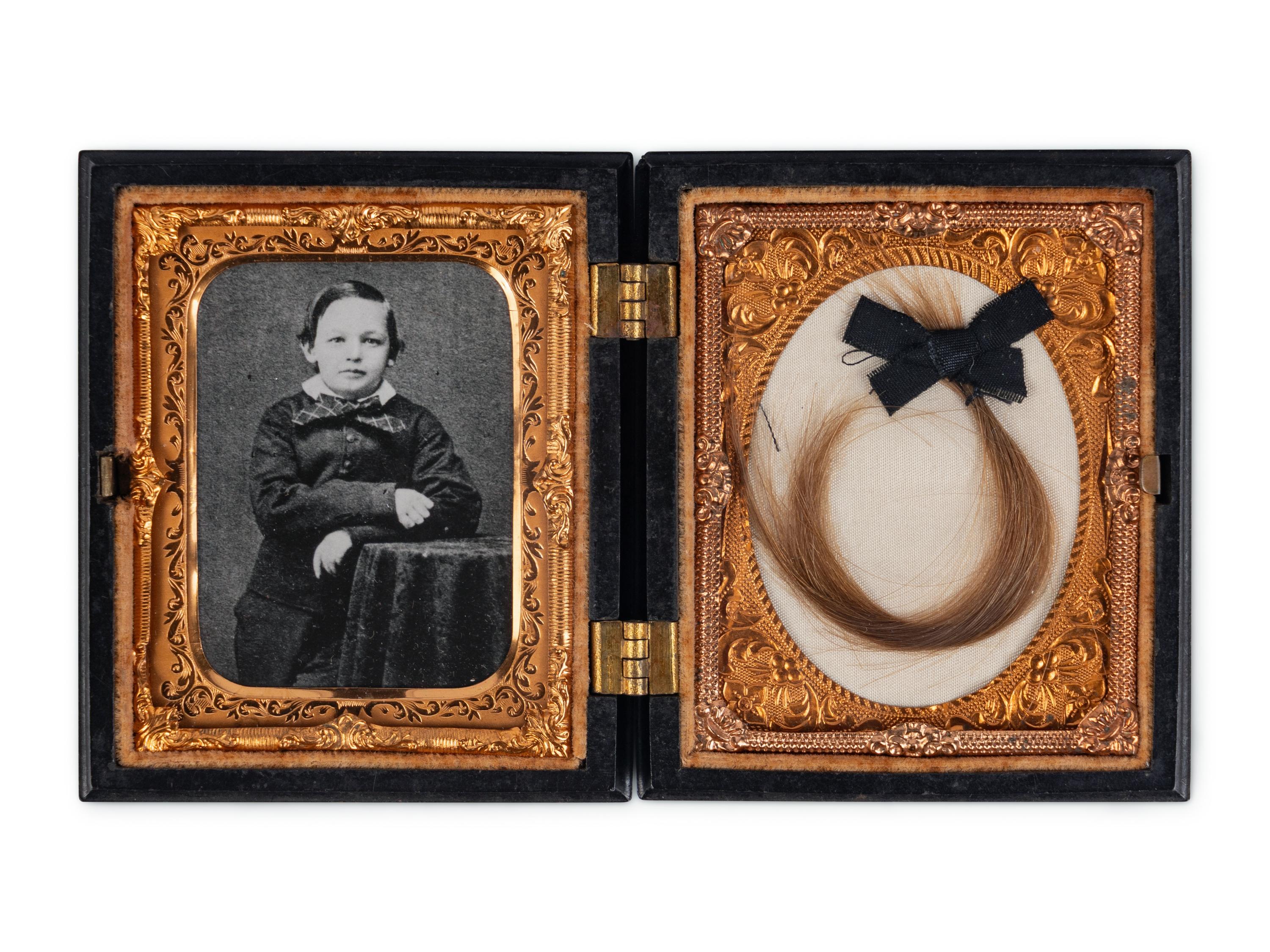 [LINCOLN FAMILY]. Locks of hair purportedly from Abraham Lincoln, Mary Todd Lincoln, and William ("Willie") Lincoln.