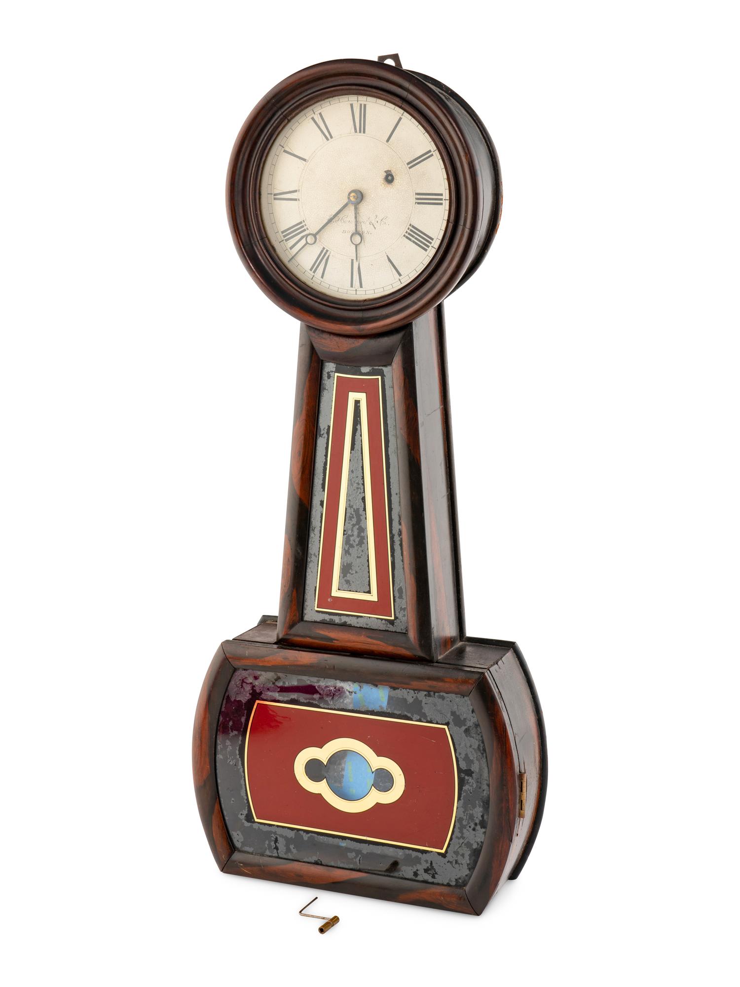 A Grain Painted and Eglomise Banjo Clock