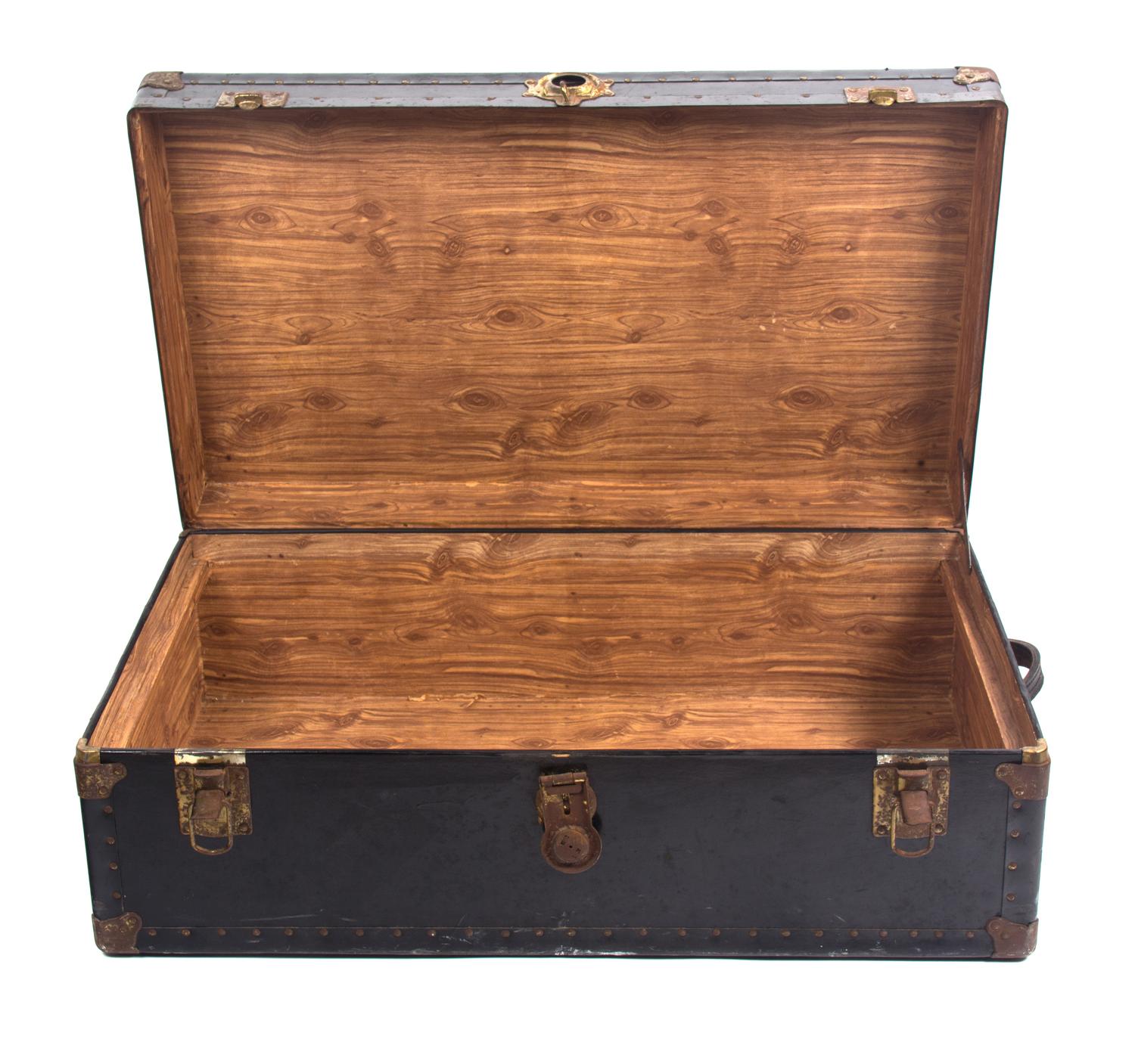 A Black Metal Steamer Trunk Height 12 1/2 inches x width 36 inches x depth 21 7/8 inches.