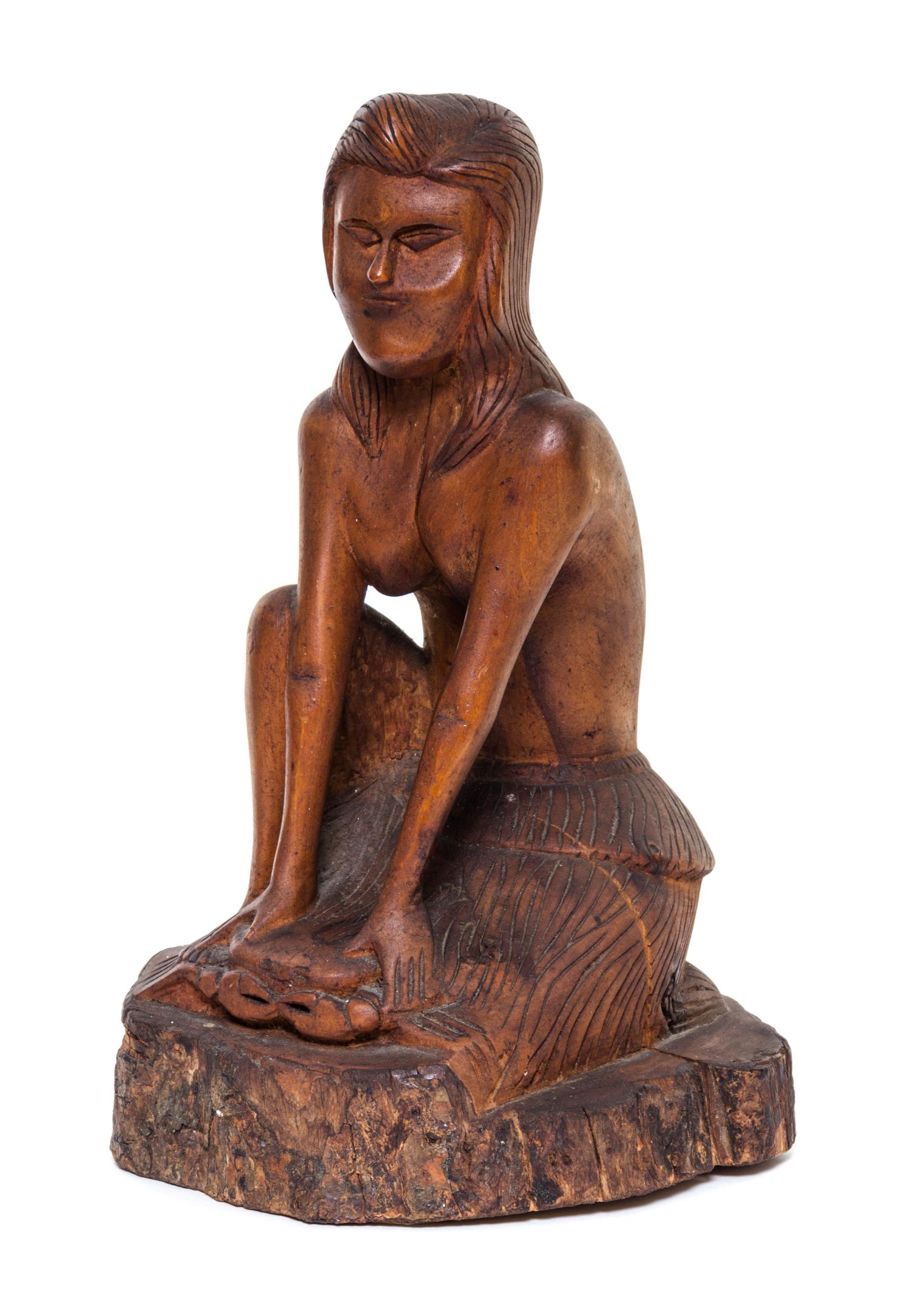 An American Carved Wood Figure Height 11 1/2 inches.
