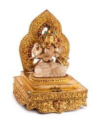 A Tibetan Rock Crystal Figure Height 12 1/4 inches.