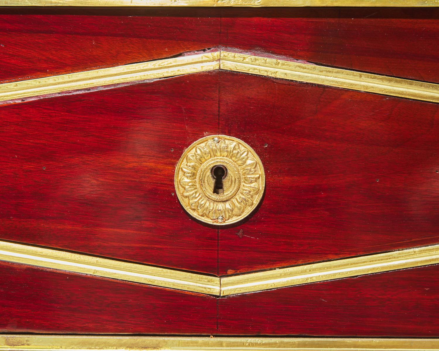 A Neoclassical brass- mounted and inlaid mahogany commode, Baltic Region, circa 1800