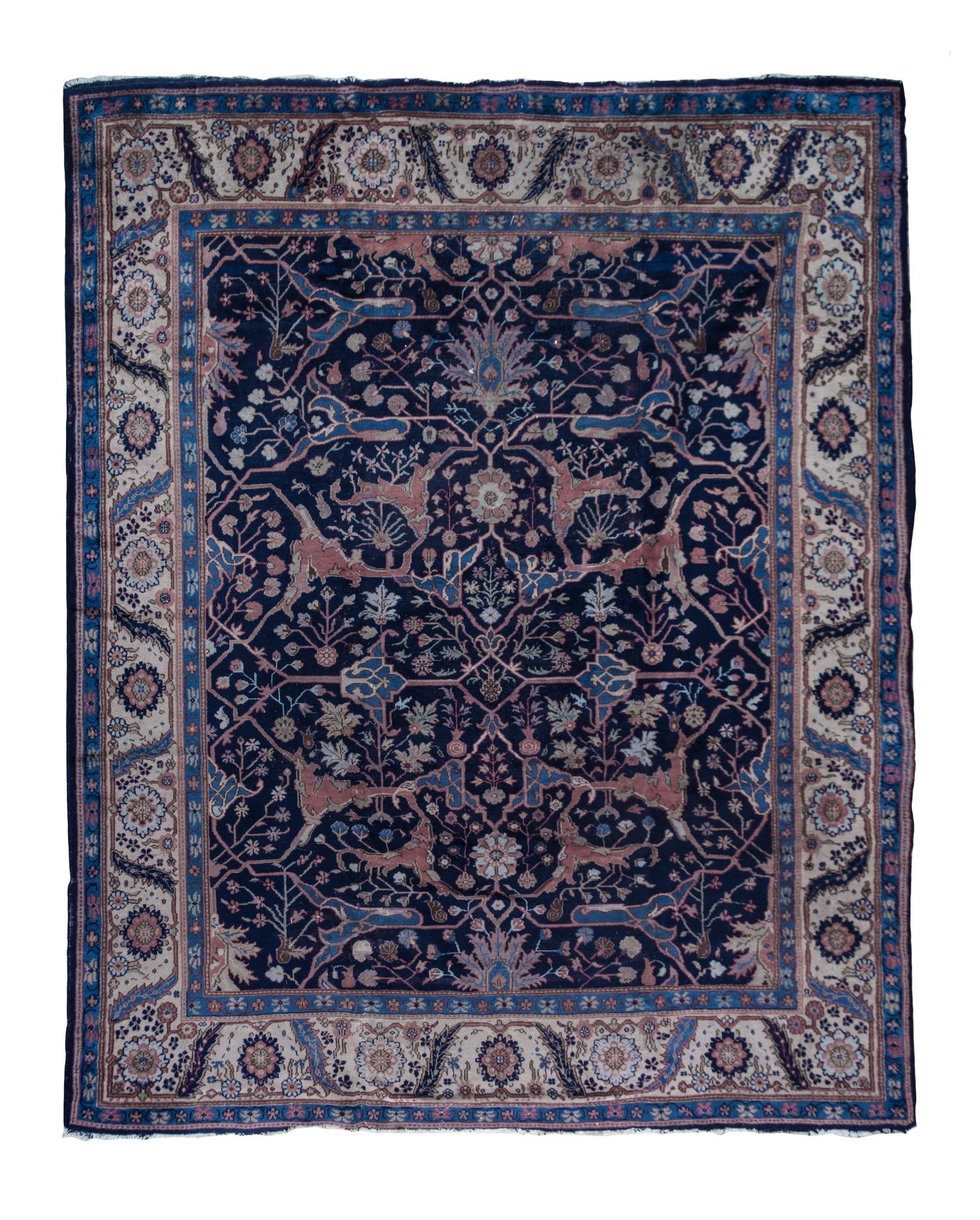 A Sarouk Wool Rug 11 feet x 9 feet 6 inches.