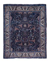 A Sarouk Wool Rug 11 feet x 9 feet 6 inches.