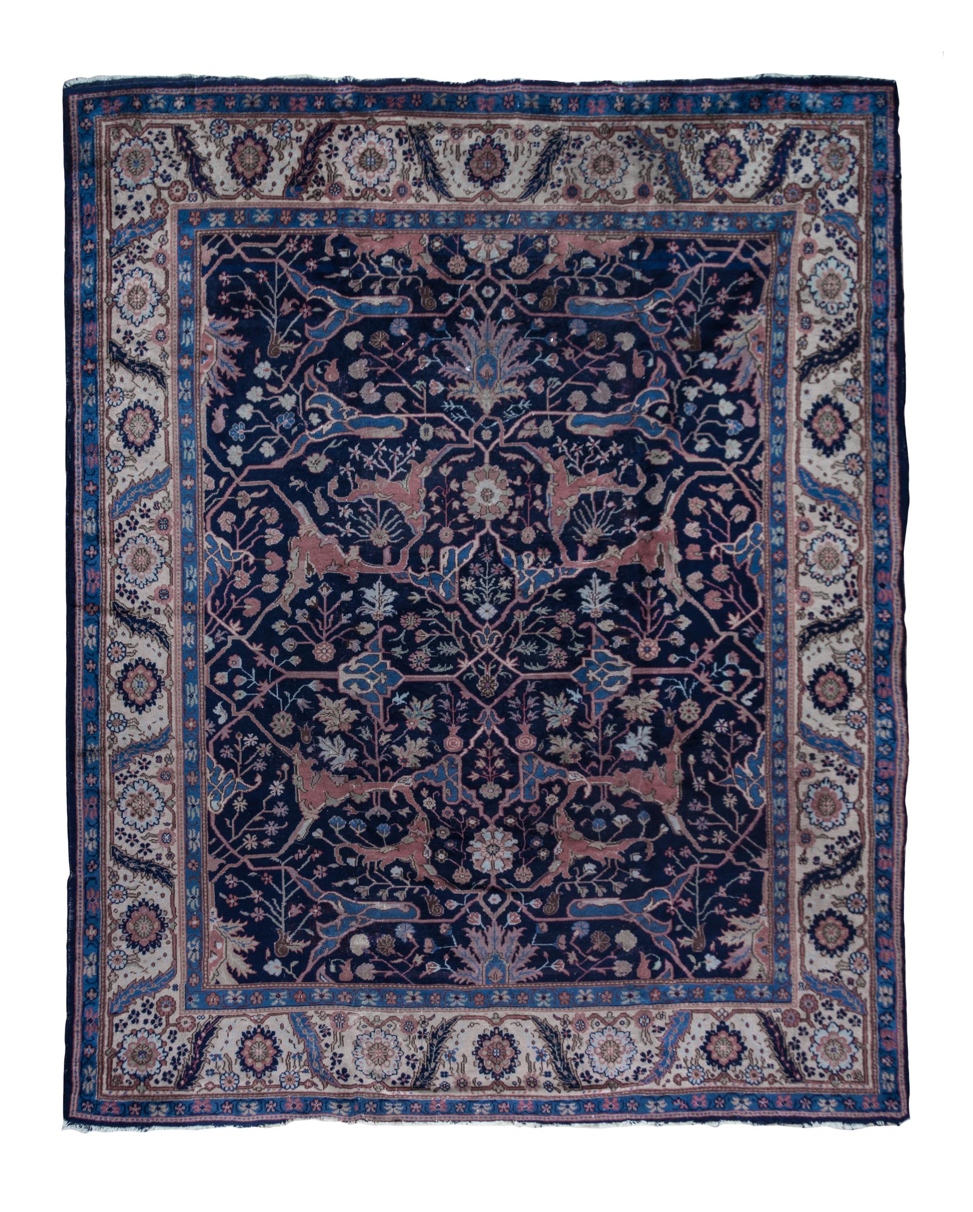 A Sarouk Wool Rug 11 feet x 9 feet 6 inches.