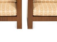 A Pair of Modernist Walnut Club Chairs