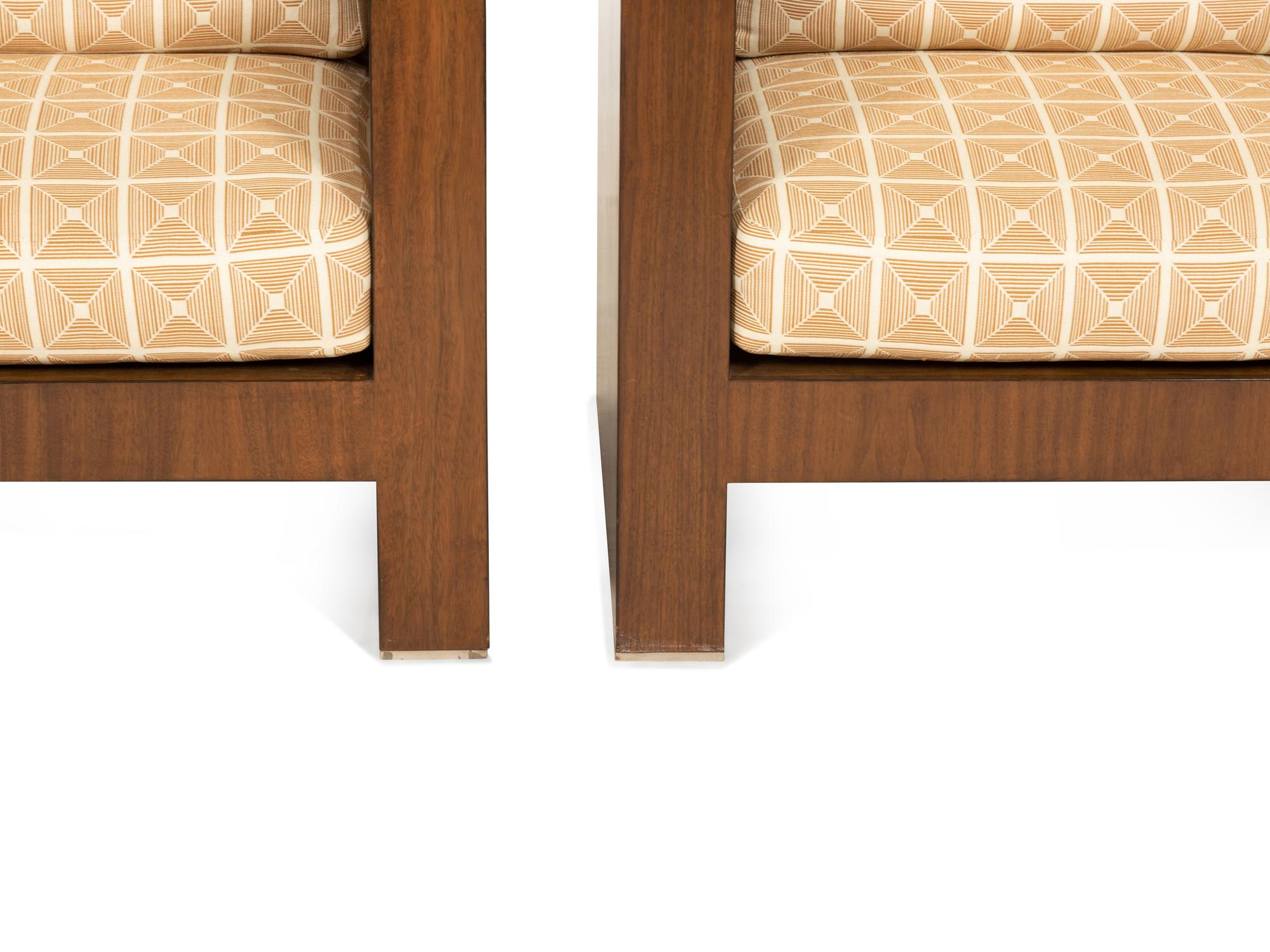 A Pair of Modernist Walnut Club Chairs