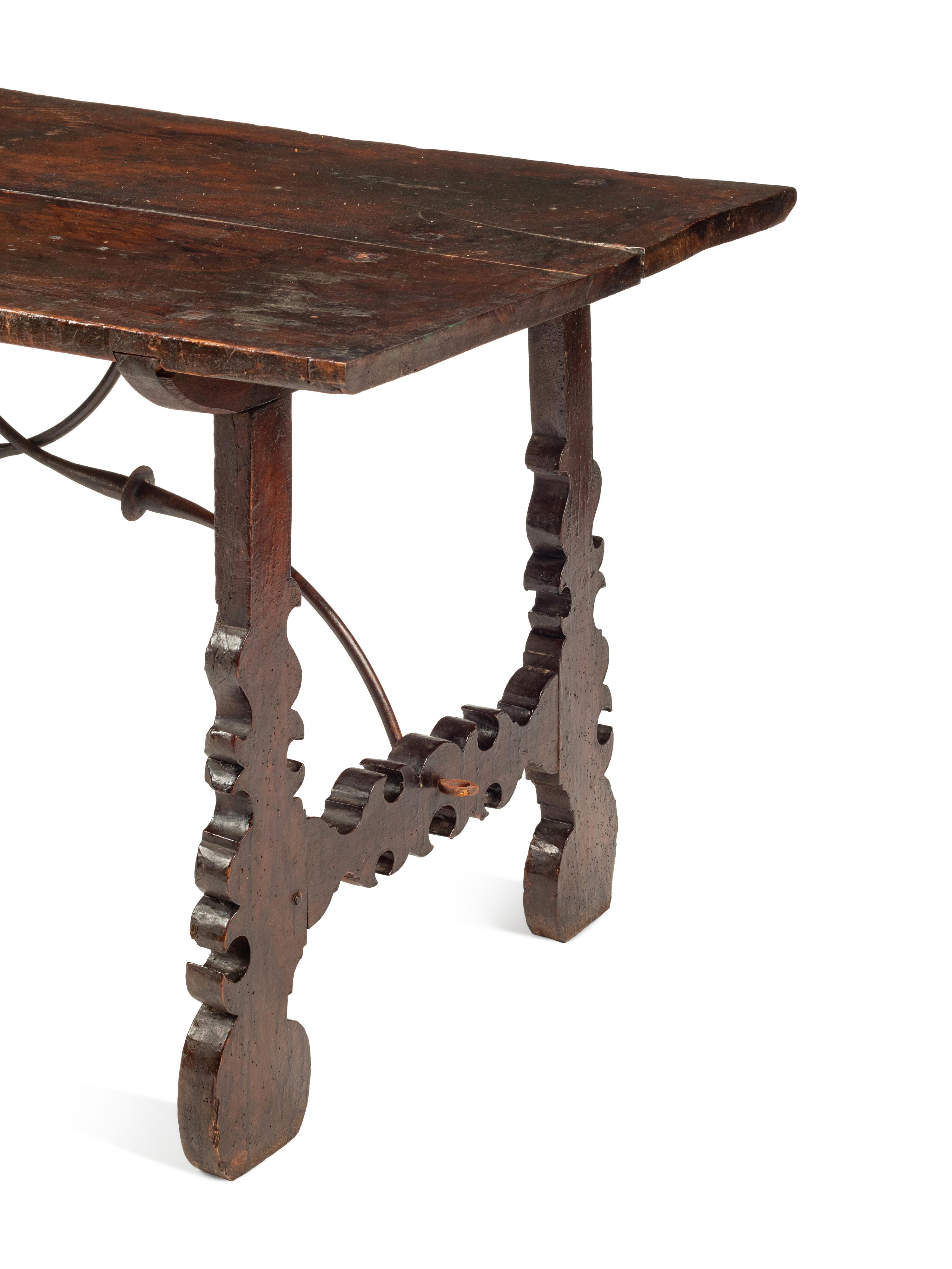 A Spanish Baroque Iron Mounted Walnut Trestle Table