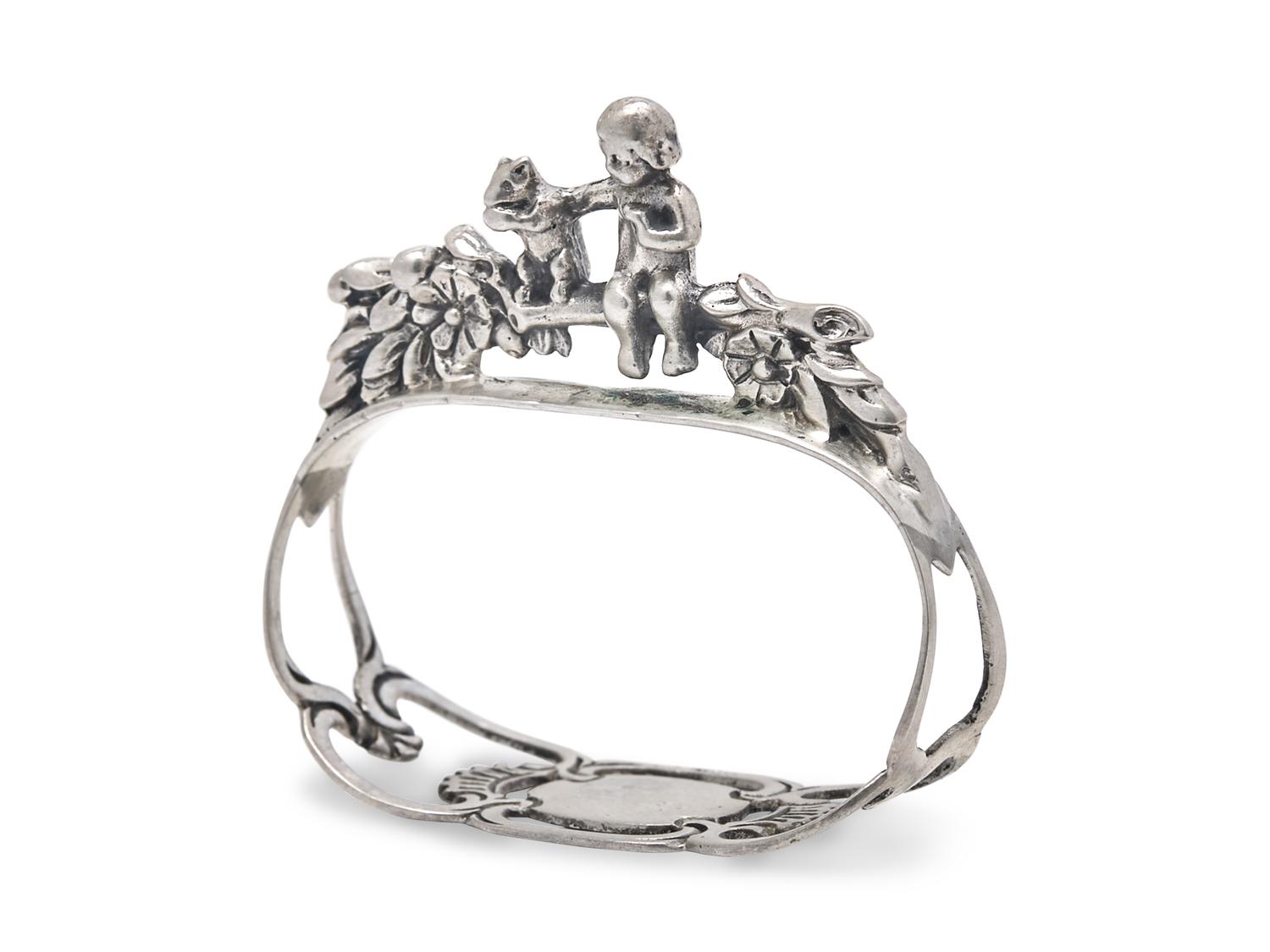 A Set of Fifteen German Silver Napkin Rings
