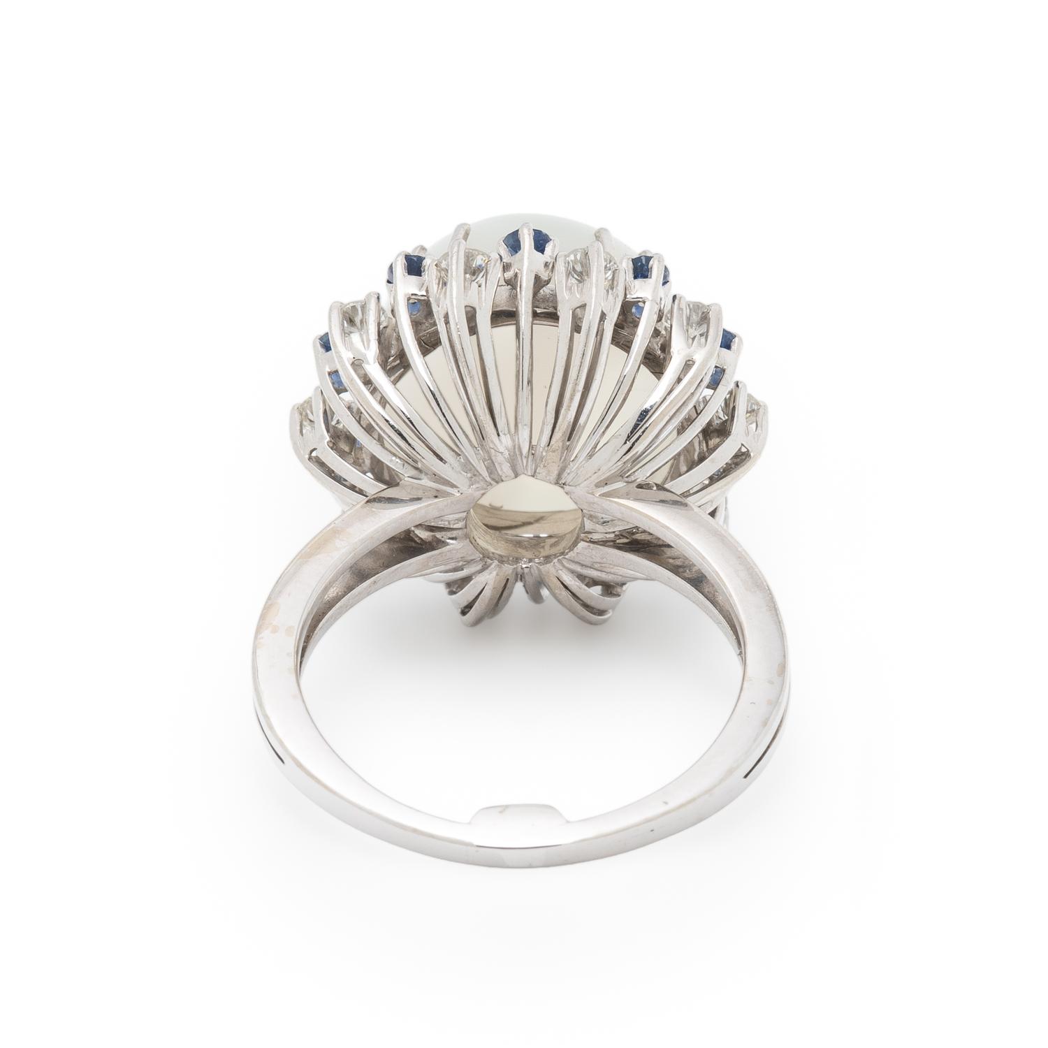 CAT'S EYE MOONSTONE, DIAMOND, AND SAPPHIRE RING
