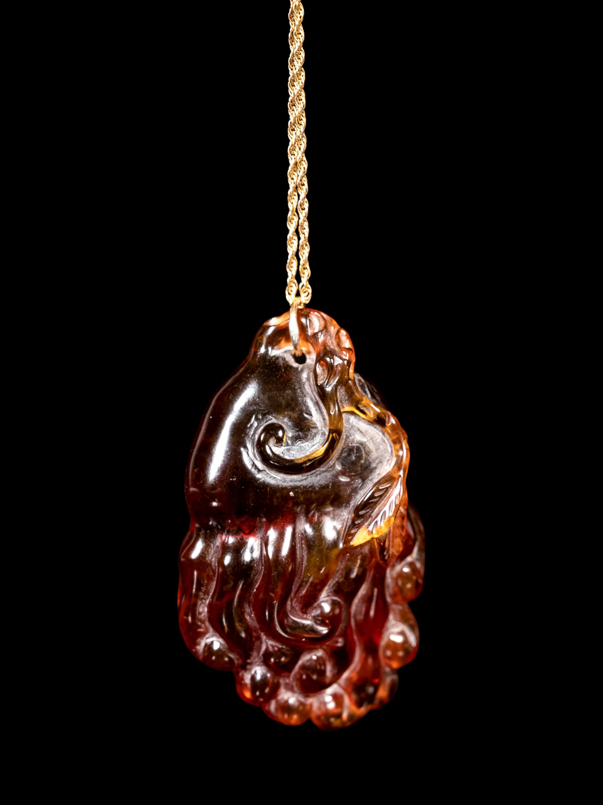 Two Chinese Precious Stone Buddha's Hand Citron-Form Pendants