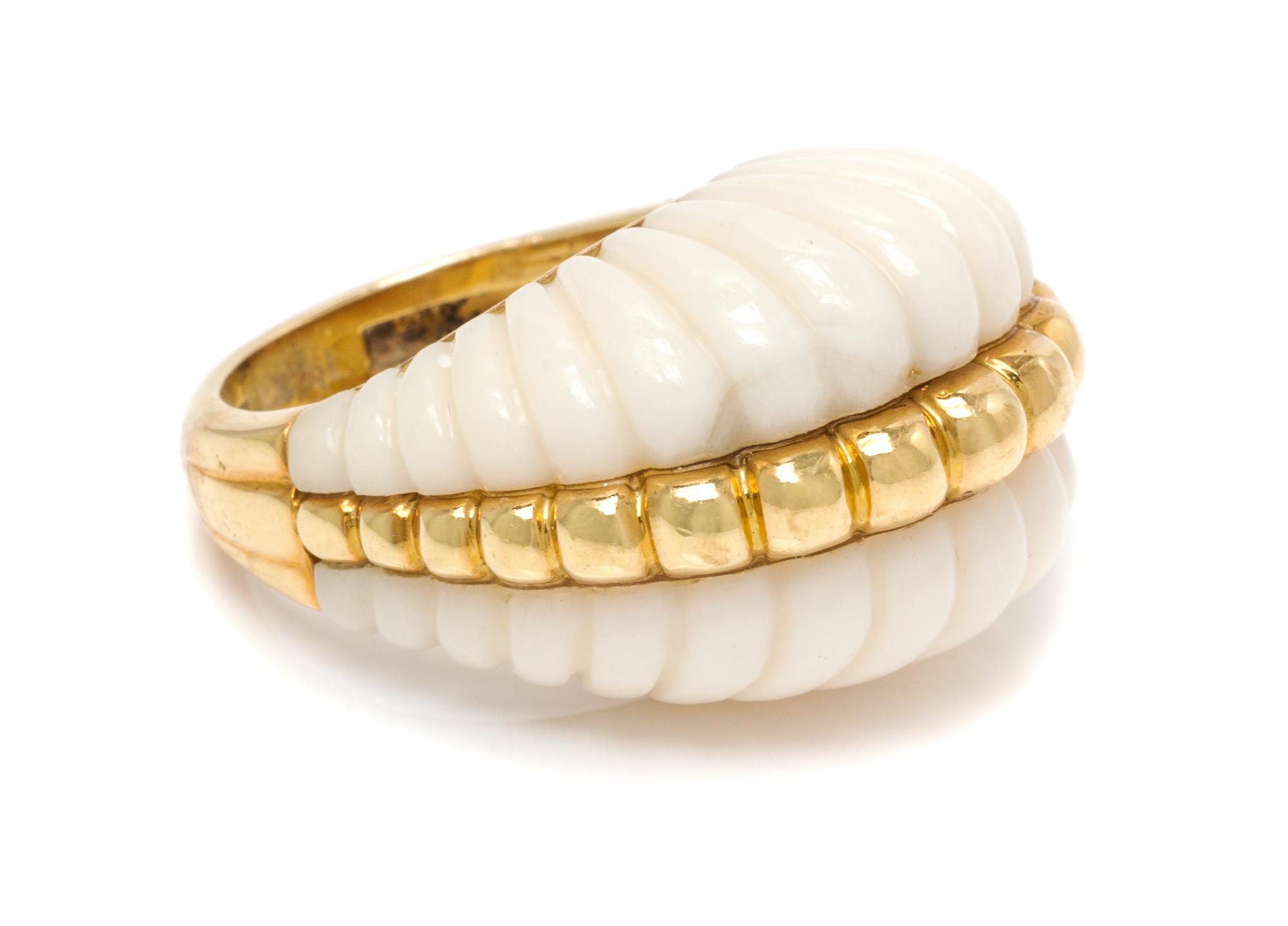 An 18 Karat Yellow Gold and White Coral Bombe Ring, 9.70 dwts.