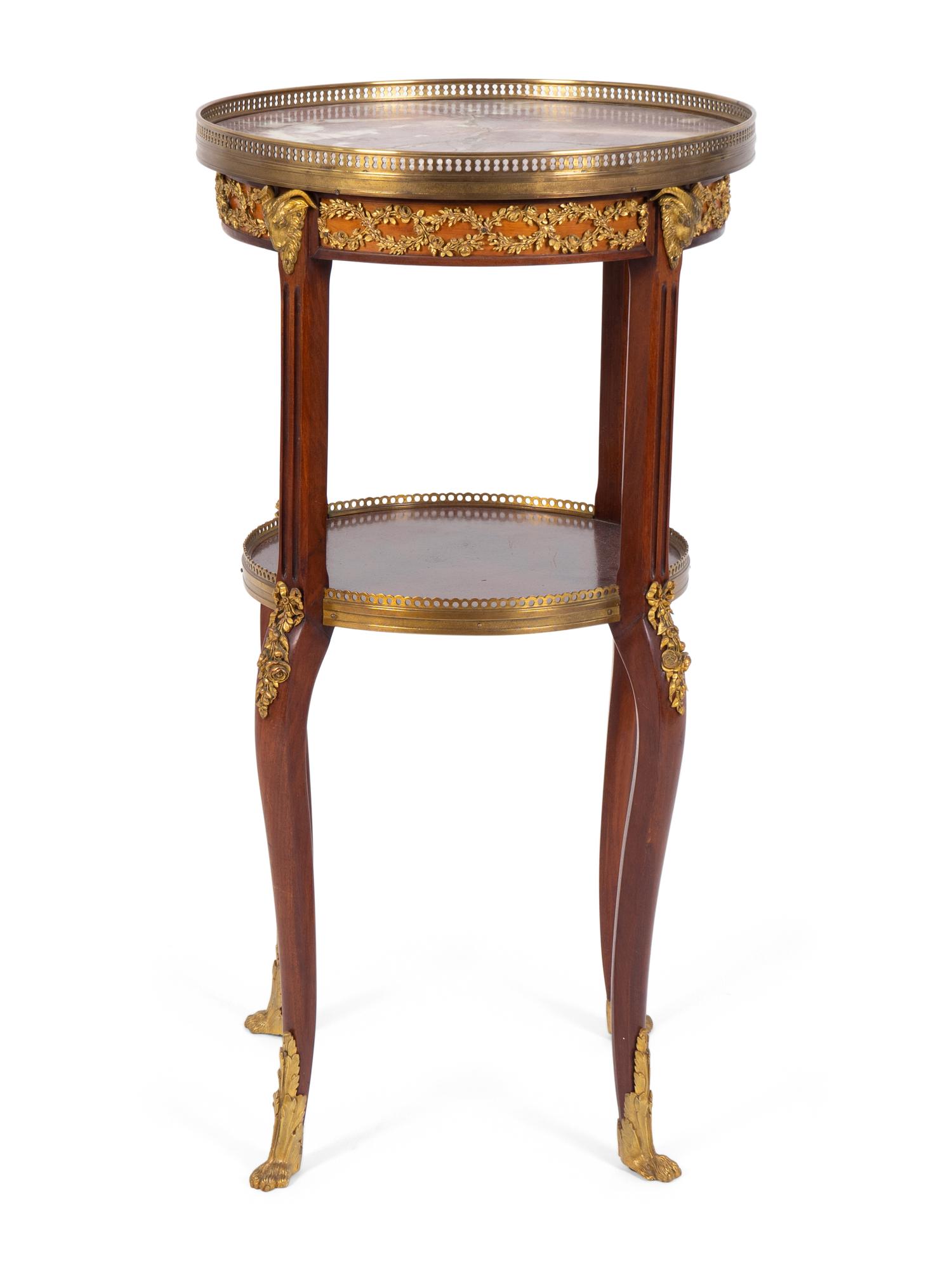 A Louis XV/XVI Transitional Gilt Metal Mounted Marble Top Two-Tier Gueridon — 19TH CENTURY