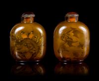 A Pair of Inside Painted Glass Snuff Bottles Height 3 3/4 inches.